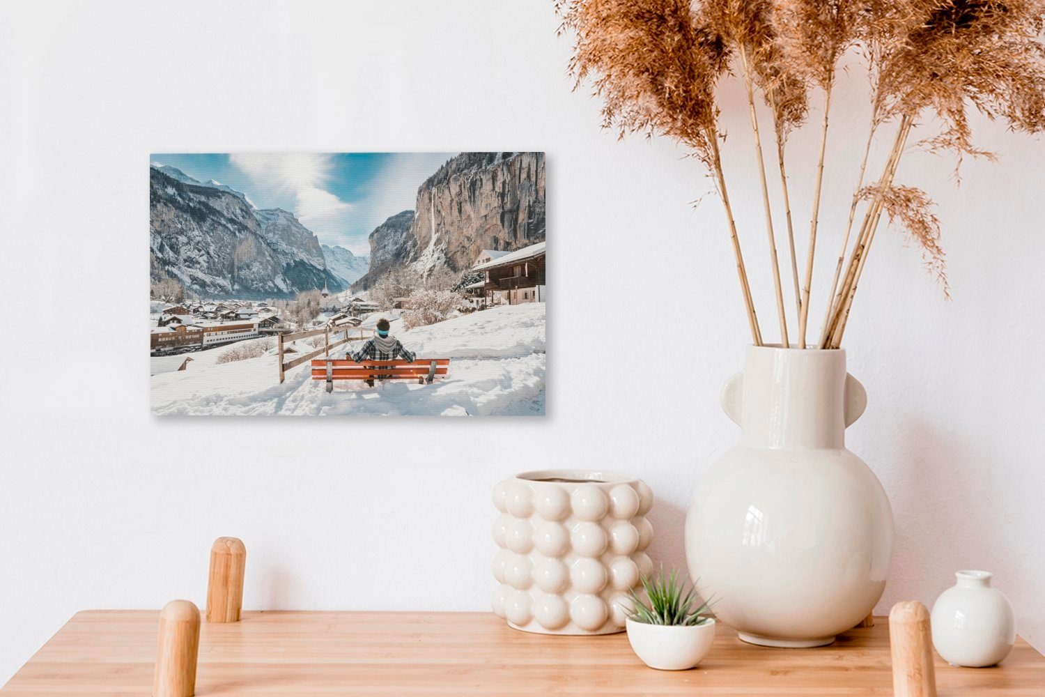 St), Bank Leinwandbild Wanddeko, (1 Leinwandbilder, der OneMillionCanvasses® cm Wandbild Schweiz, auf in im Winter einer 30x20 Mann Aufhängefertig,