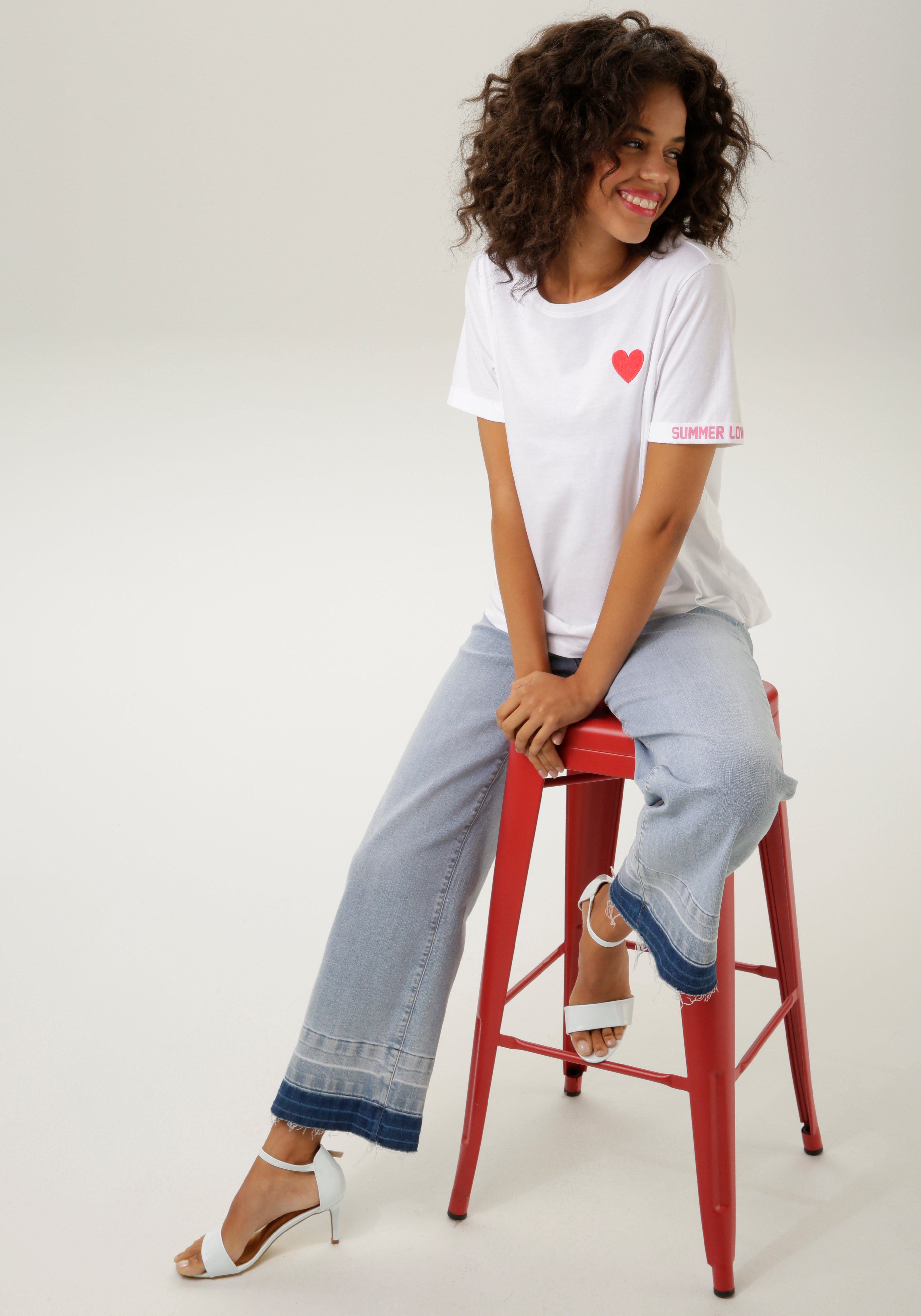 Aniston CASUAL Straight-Jeans mit trendiger leicht ausgefranstem Saum used bleached Waschung am