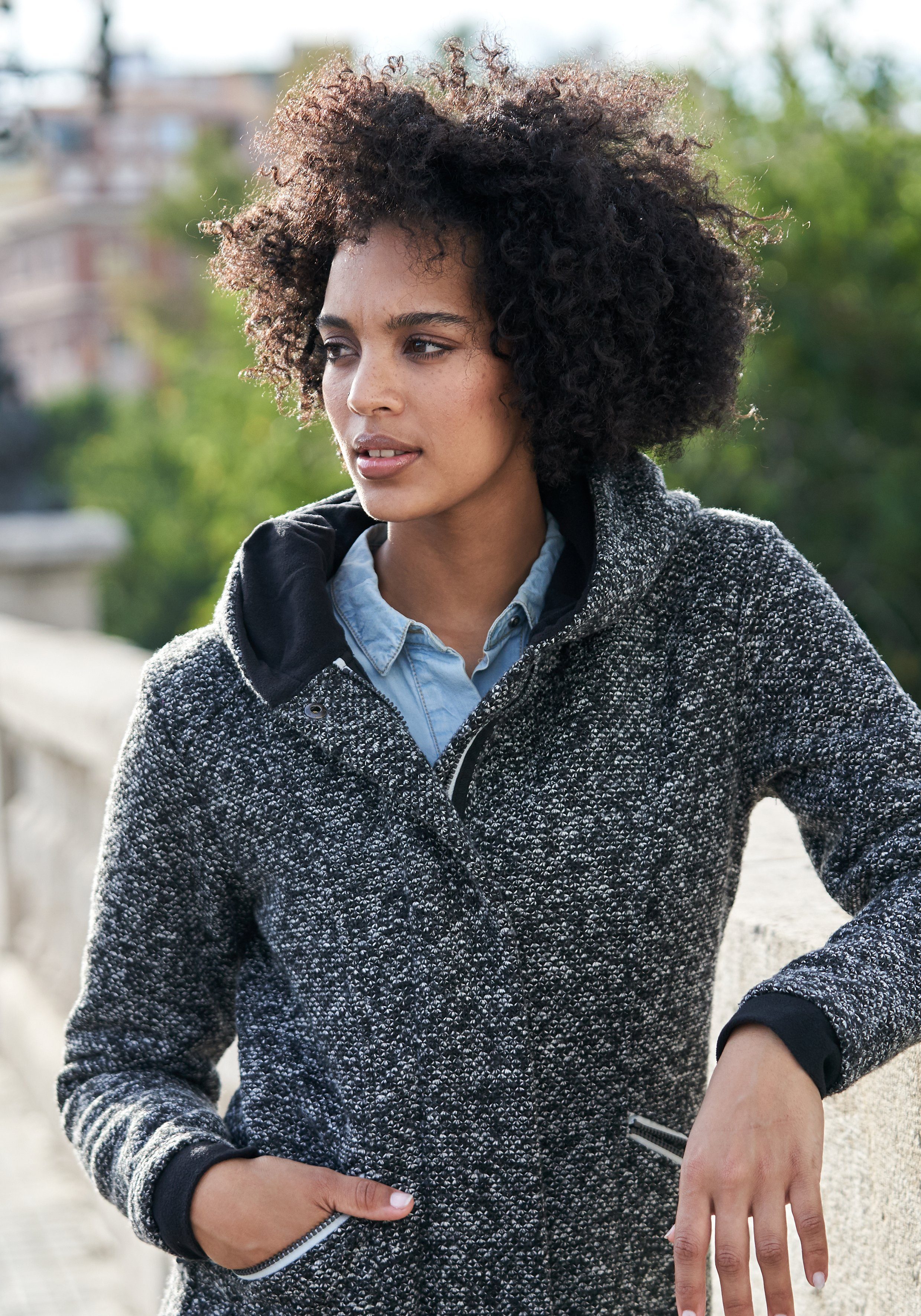 Polarino Strickmantel atmungsaktiv und wärmeisolierend. Strickoptik außen, Fleece innen.