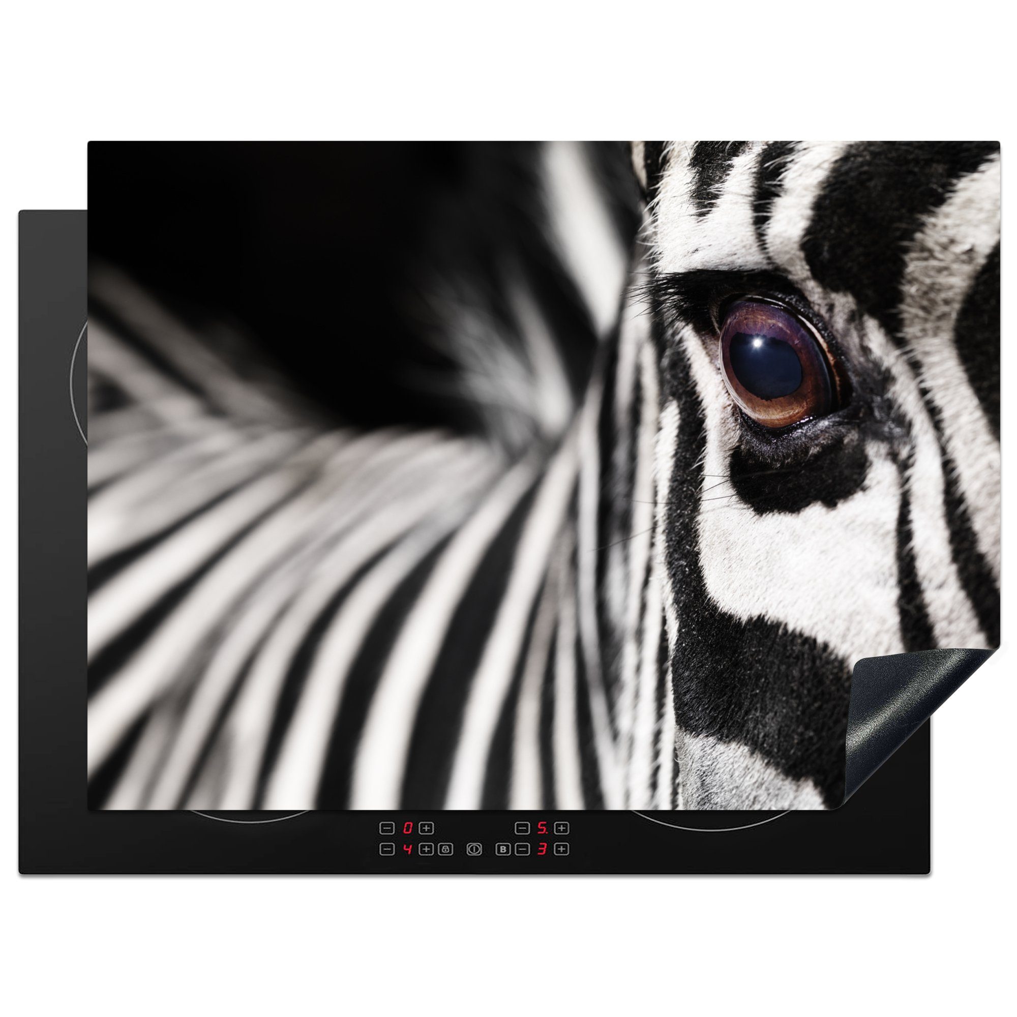 MuchoWow Herdblende-/Abdeckplatte Nahaufnahme des Auges eines Zebras, Vinyl, (1 tlg), 70x52 cm, Mobile Arbeitsfläche nutzbar, Ceranfeldabdeckung