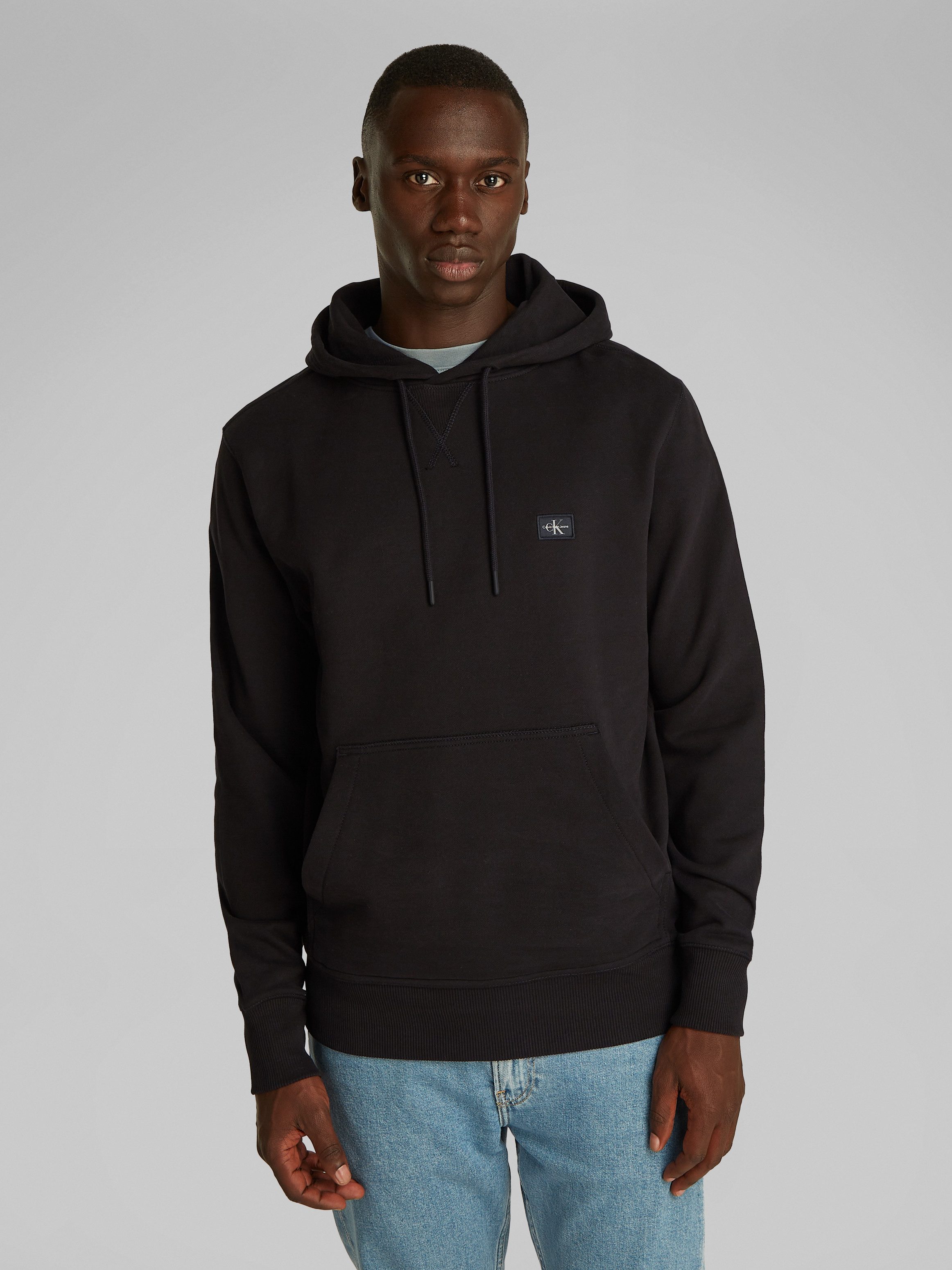 Calvin Klein Jeans Sweatshirt WOVEN LABEL HOODIE Kängurutasche, Logostickerei. Reduzierter Preis € 73,99. Unverbindliche Preisempfehlung € 99,90