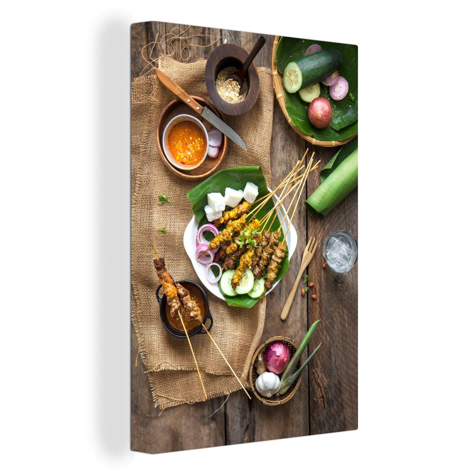 OneMillionCanvasses® Leinwandbild Draufsicht auf das Essen mit malaysischem Hühnchen-Satay, (1 St), Leinwandbild fertig bespannt inkl. Zackenaufhänger, Gemälde, 20x30 cm