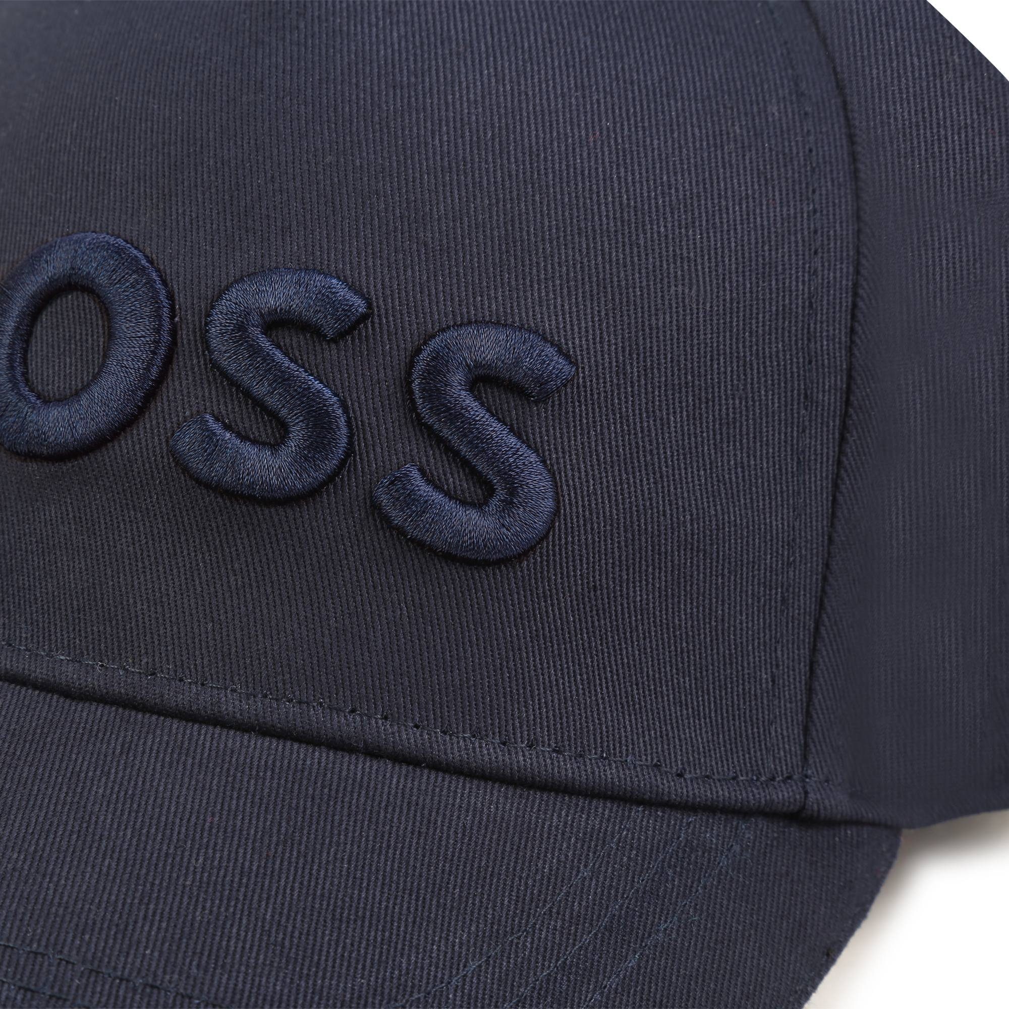 BOSS Baseball Cap Boss Kidswear DC Kappe. x Mehr Statement! eine Ein - nur als Comics