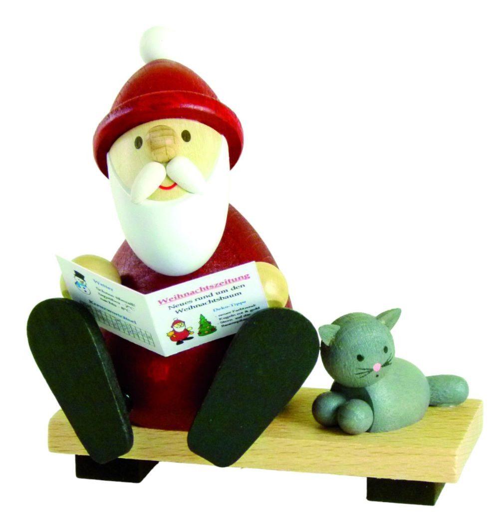 Ullrich Kunsthandwerk Weihnachtsmann Ullrich Dekofigur Weihnachtsmann sitzend mit Zeitung und Katze, Holzkunst aus dem Erzgebirge