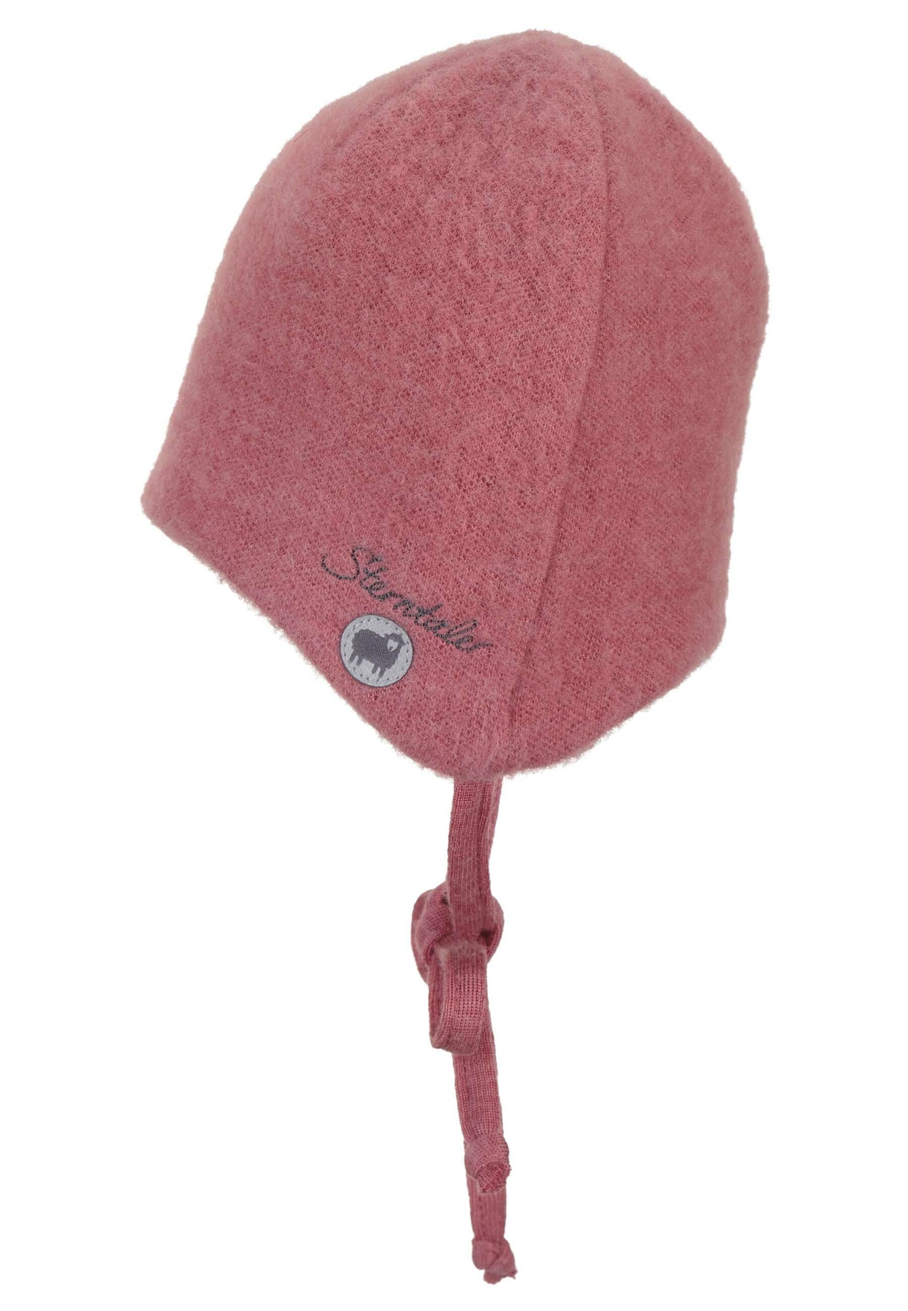 Sterntaler® Schlupfmütze Mütze (1-St., für farbig Ohrenklappen) Baby mit Bindeband aus angeschnittenen unifarben rosa Merinowolle Wintermütze Beanie Mütze und Kinder weicher