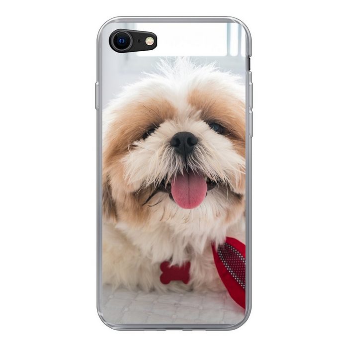 MuchoWow Handyhülle Ein Shih Tzu Hund liegt auf einem weißen Bett Handyhülle Apple iPhone 8 Smartphone-Bumper Print Handy Schutzhülle