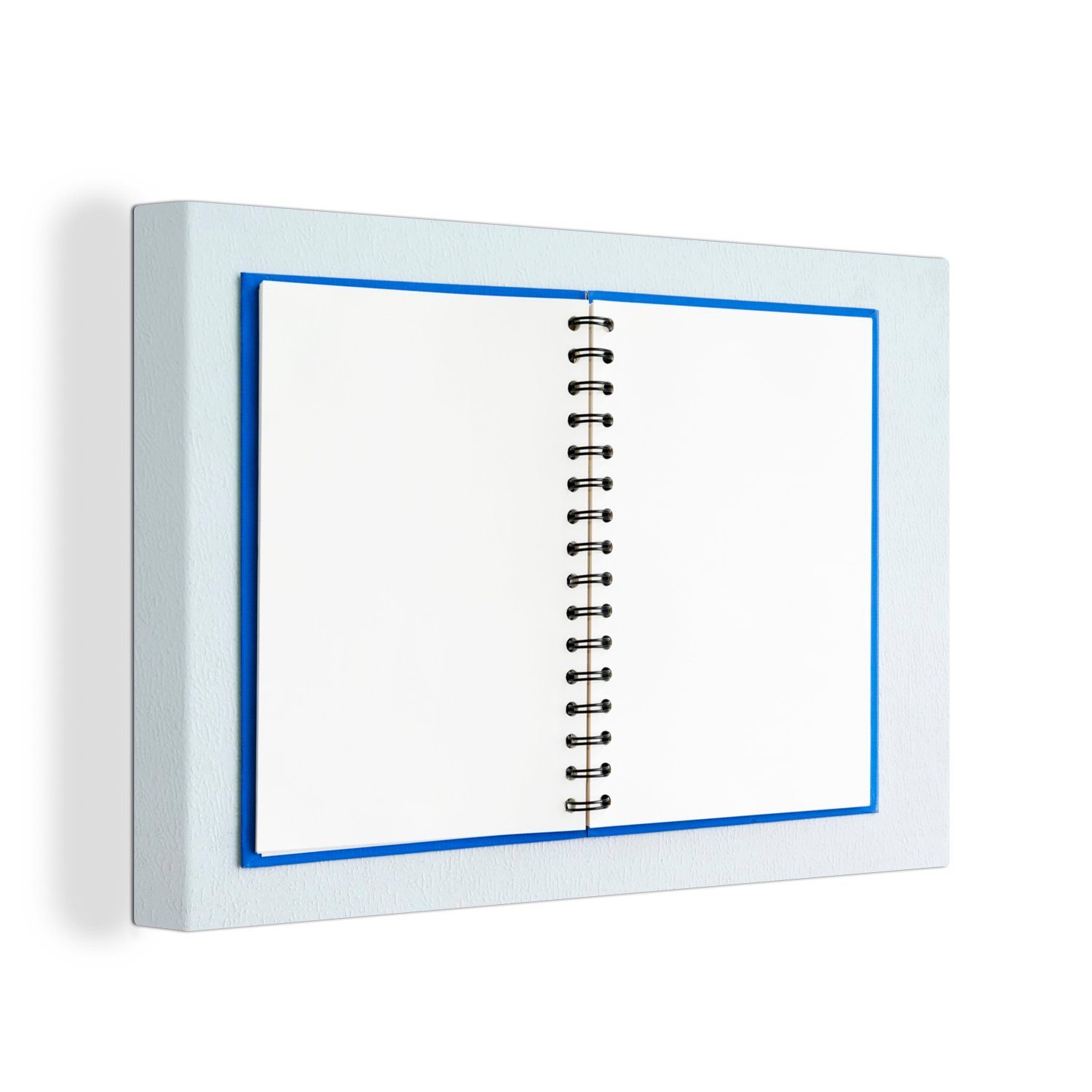 OneMillionCanvasses® Leinwandbild Ein leeres Tagebuch mit einem Ringbuch auf einem hellblauen, (1 St), Wandbild Leinwandbilder, Aufhängefertig, Wanddeko, 30x20 cm