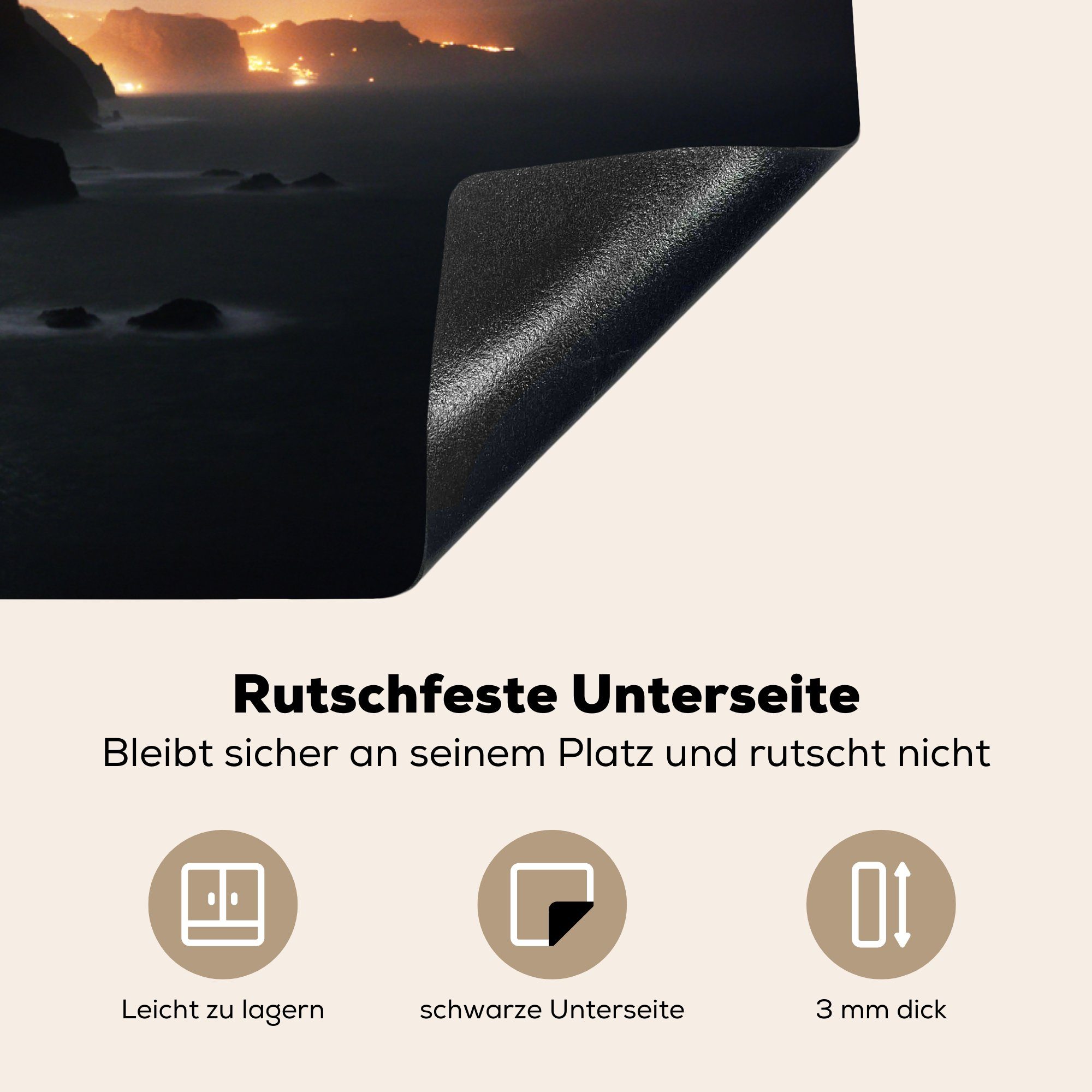 MuchoWow Herdblende-/Abdeckplatte Die Lichter der Madeiras leuchten tlg), am entlang Nacht, in für Stadt 81x52 Induktionskochfeld Ceranfeldabdeckung die (1 Meer Vinyl, cm, küche, Schutz