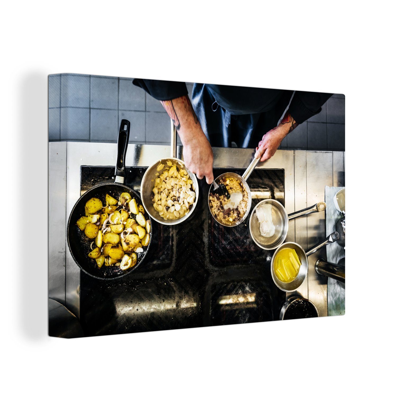OneMillionCanvasses® Leinwandbild Ein Koch, der in einem Restaurant kocht, (1 St), Wandbild Leinwandbilder, Aufhängefertig, Wanddeko, 30x20 cm