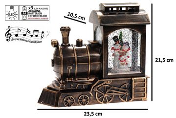 ELLUG Schneekugel winterliche Lokomotive als Spieluhr mit Schneemännern, Licht & Glitzerantrieb, H.: 21,5cm