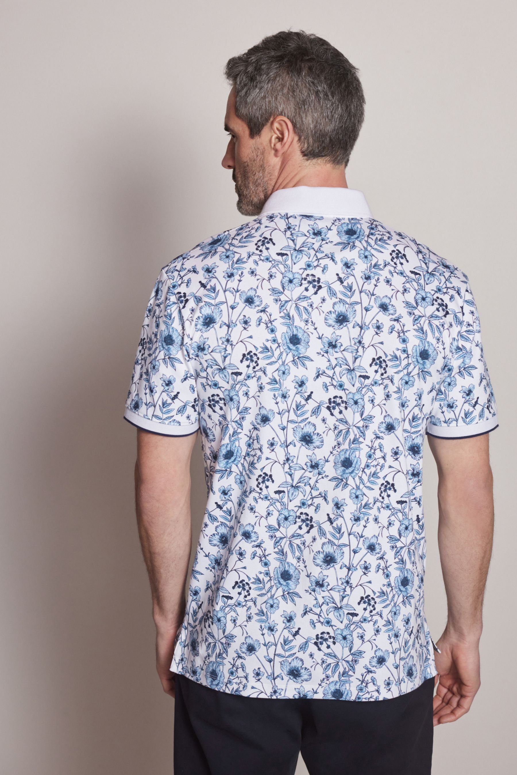 White/Blue Polo-Shirt Poloshirt (1-tlg) Next Geoprint mit Floral