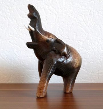 livasia Dekofigur Holzelefant, handegeschnitzter Glückselefant, Rüssel oben