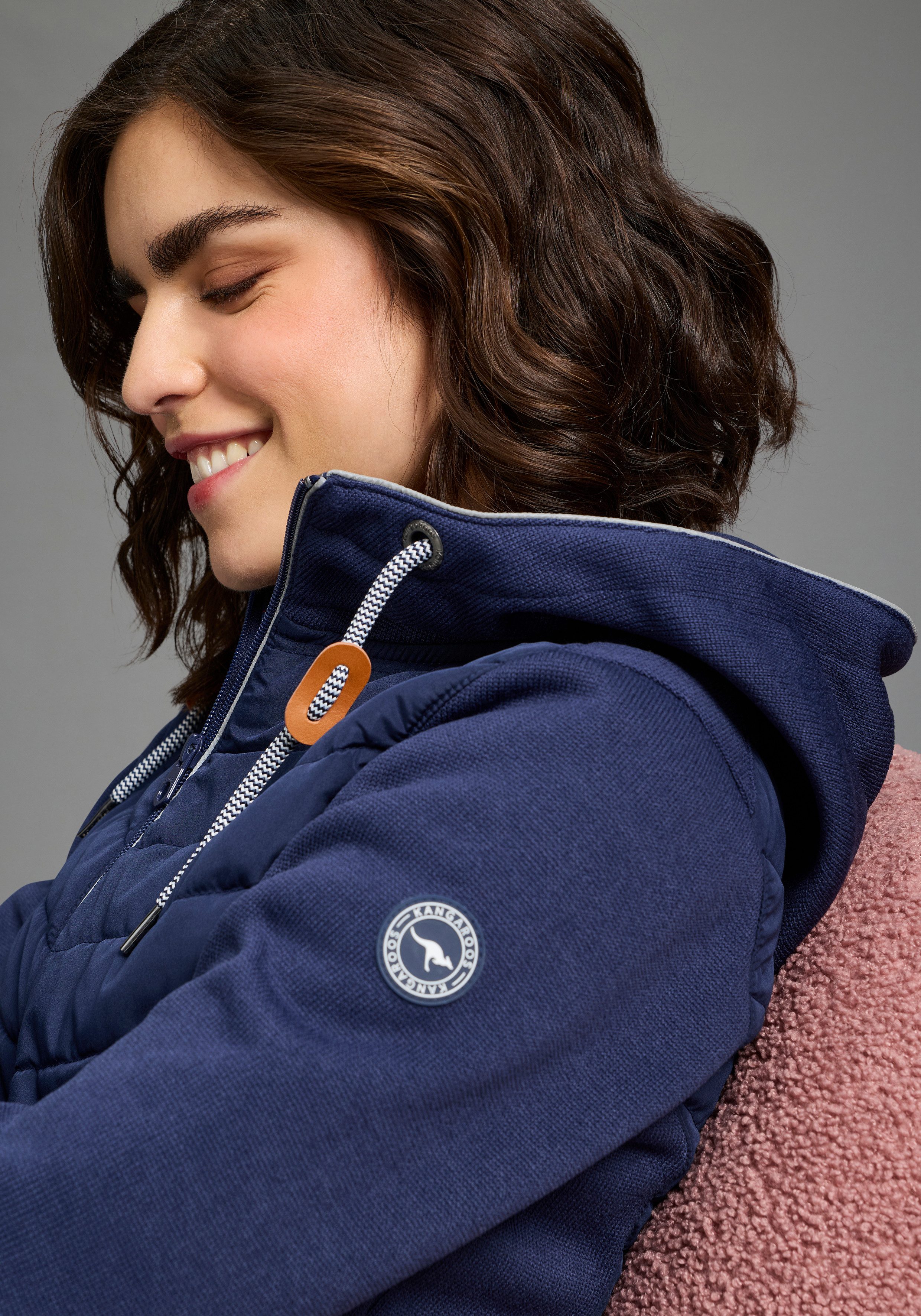 KangaROOS Hybridjacke Übergangsjacke mit Kapuze Reißverschlusstaschen