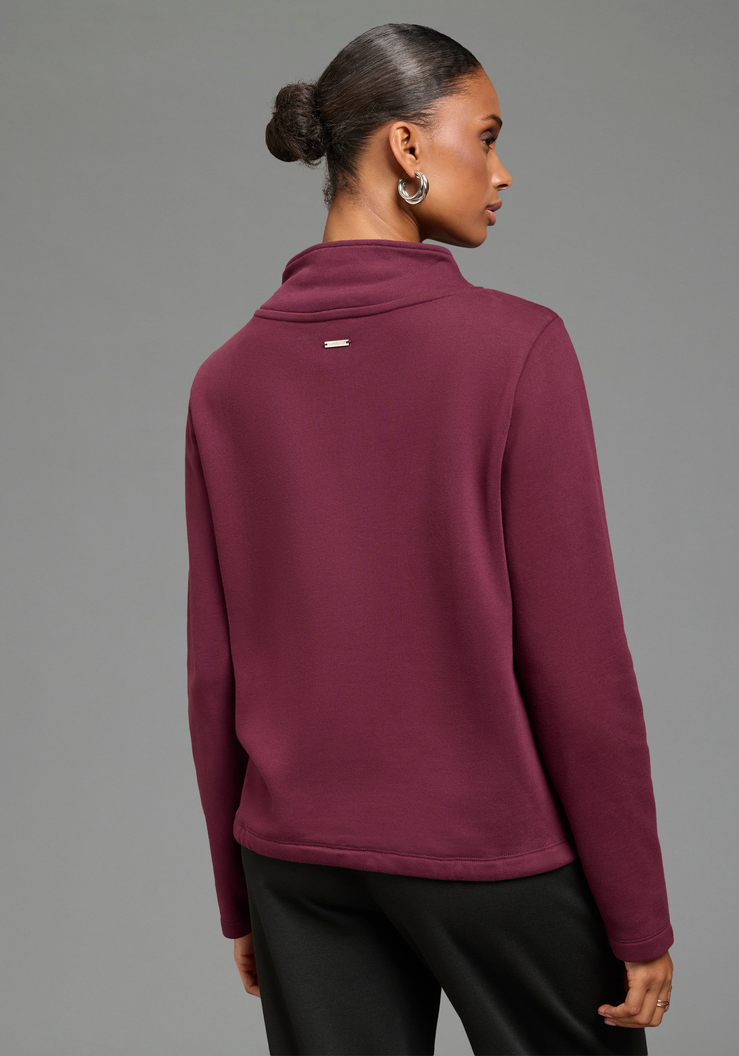 Bruno Banani Sweatshirt mit hohem Stehkragen, aus Baumwolle und Polyester. € 49,99, (€ 49,99 pro 1 Stk).