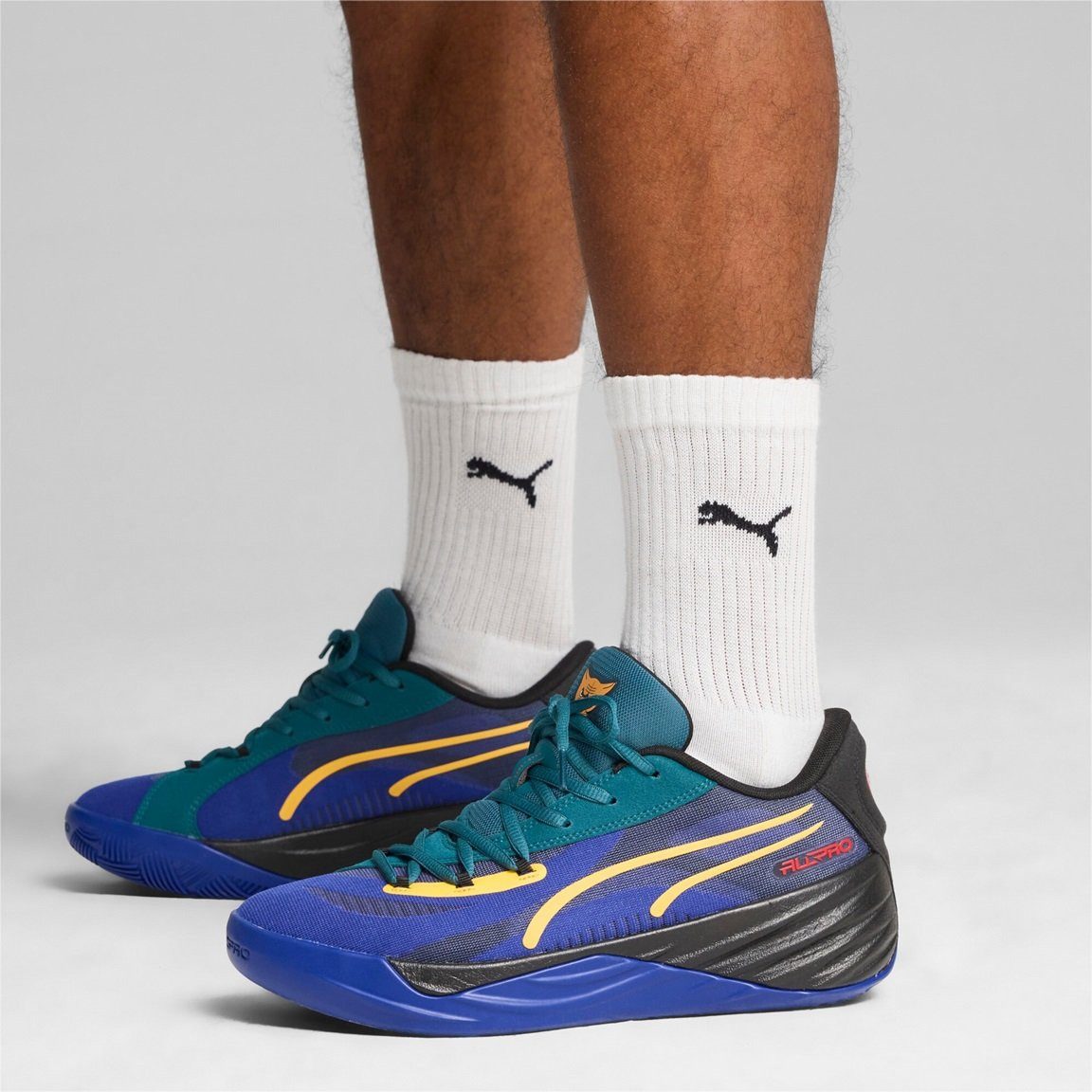 PUMA Hallen-Indoorschuhe All-Pro Nitro Crowd Craze blau/bunt Herren Badmintonschuh