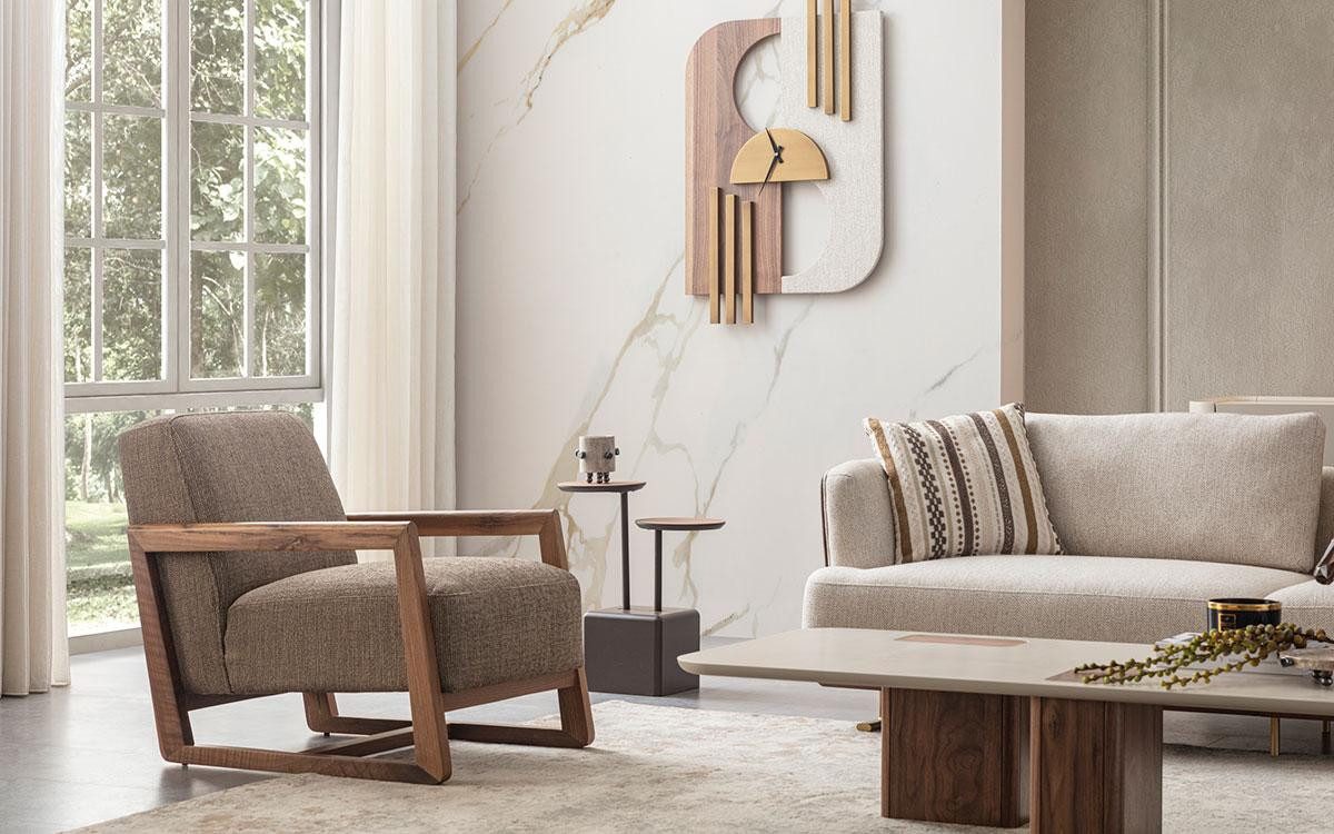 Sessel Eleganter Relaxsessel aus grauem Textil mit Holzfüßen