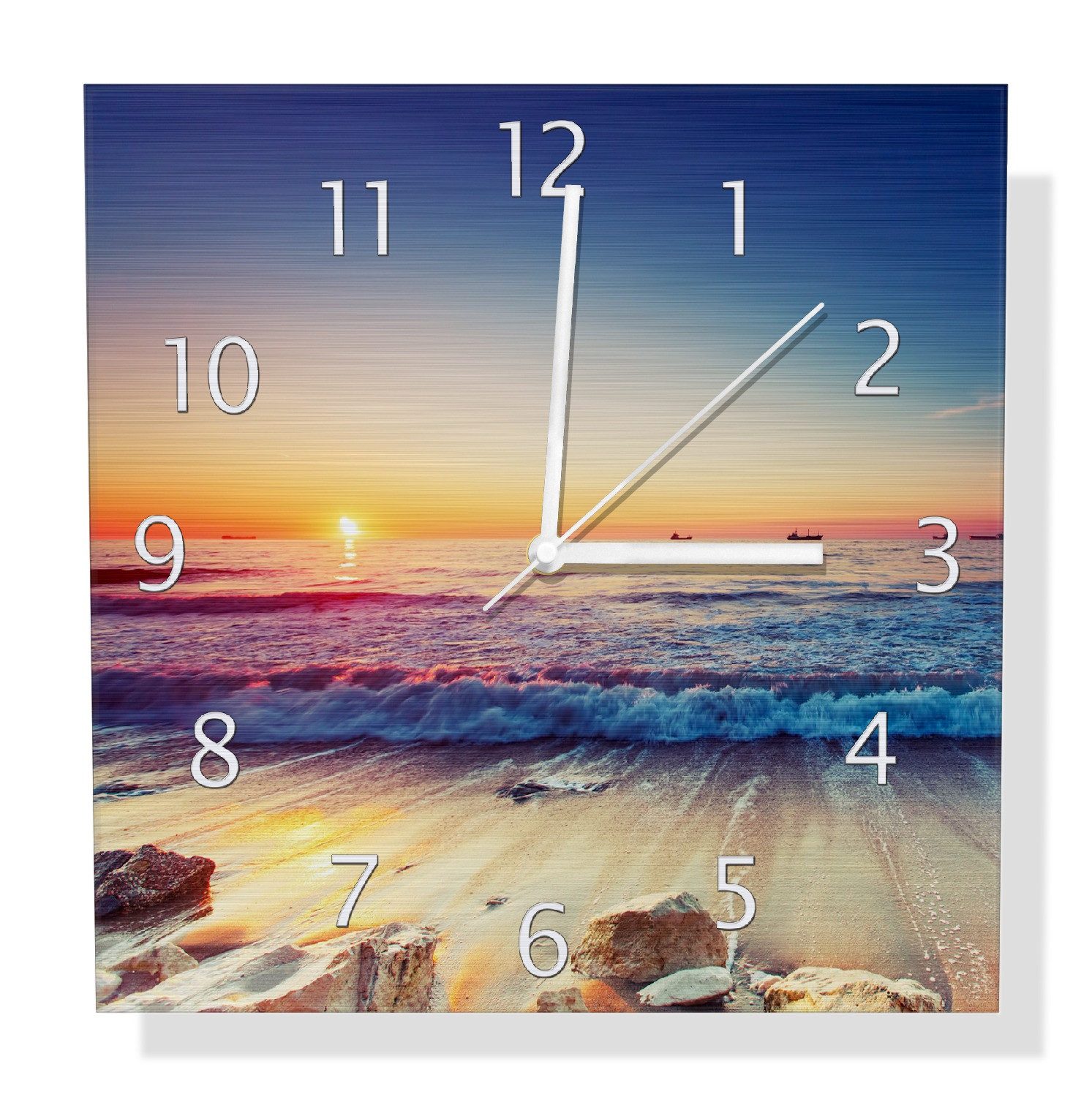 Wallario Wanduhr Sonnenuntergang am Meer mit Wellen am Strand (Aluverbunduhr)