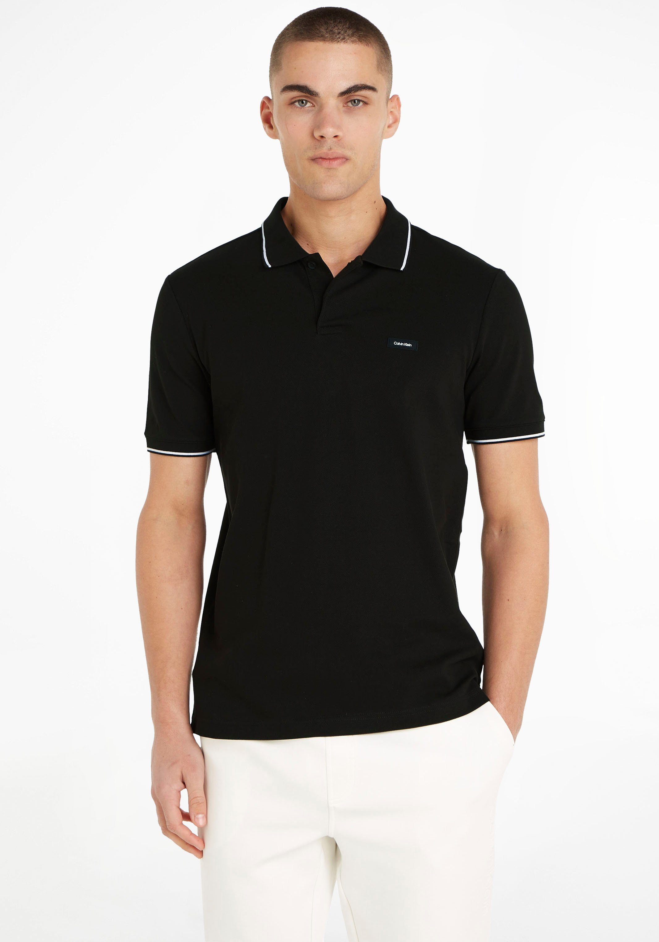 Calvin Klein Poloshirt mit Calvin Klein Logo auf der Brust schwarz