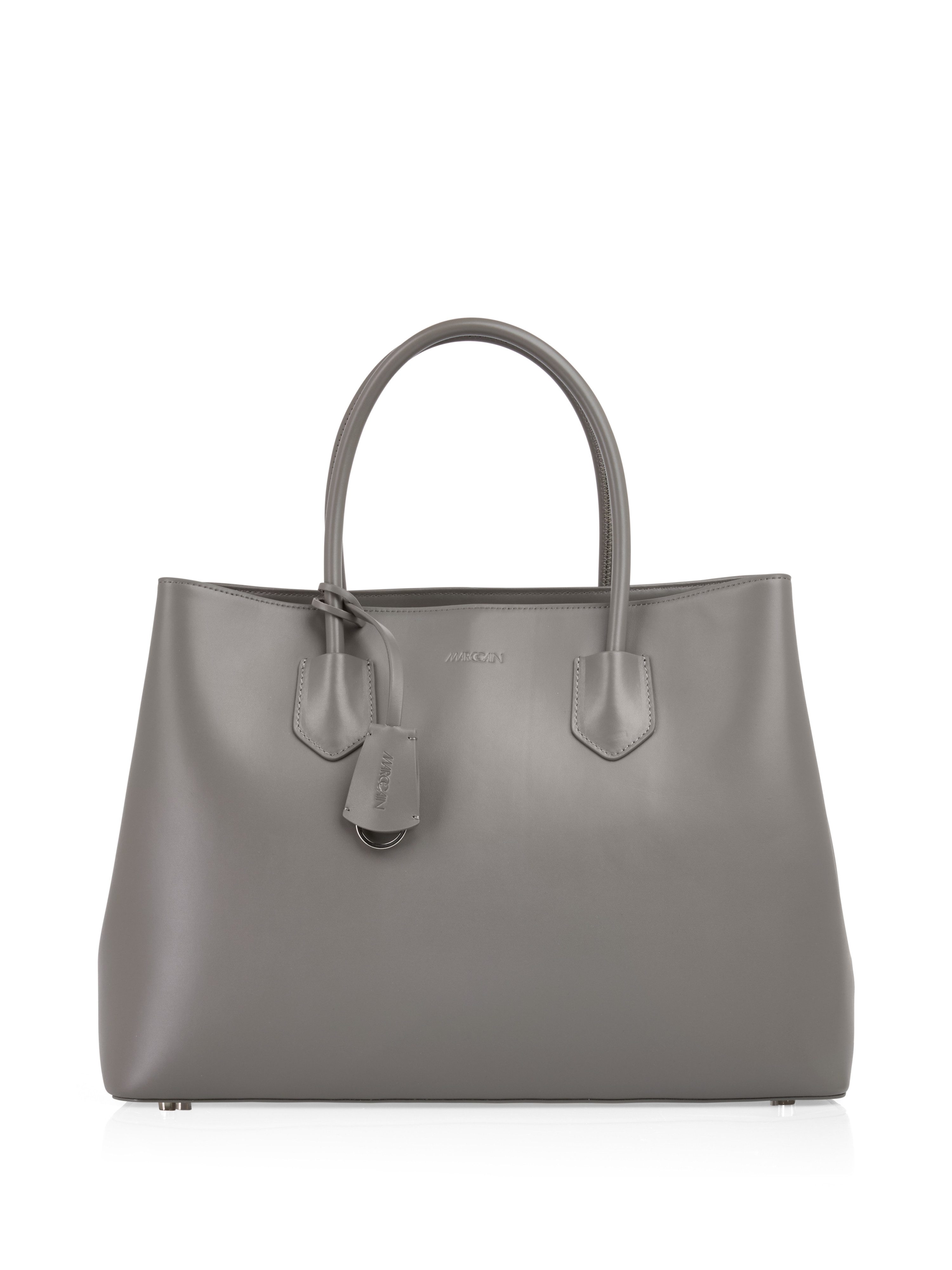 Marc Cain Elegante Ledertasche mit Logoanhänger Слипперы