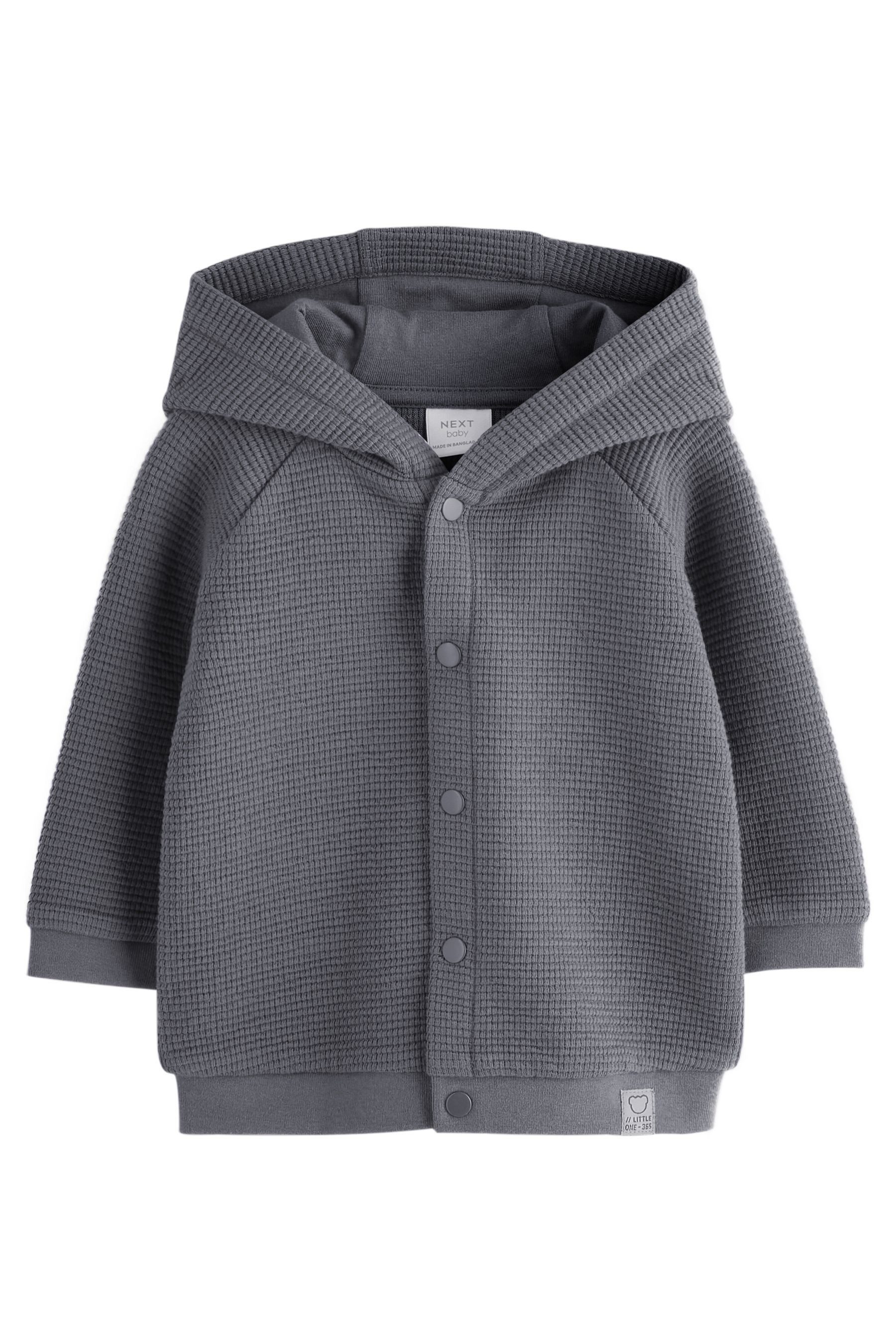 Next Strickjacke Leichte, strukturierte Jersey-Babyjacke (1-tlg)