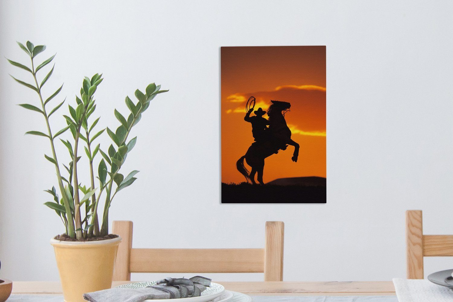 Leinwandbild inkl. Gemälde, cm Zackenaufhänger, 20x30 Cowboys dem der eines fertig OneMillionCanvasses® bespannt (1 auf Silhouette Pferderücken, tänzelt, St), Leinwandbild