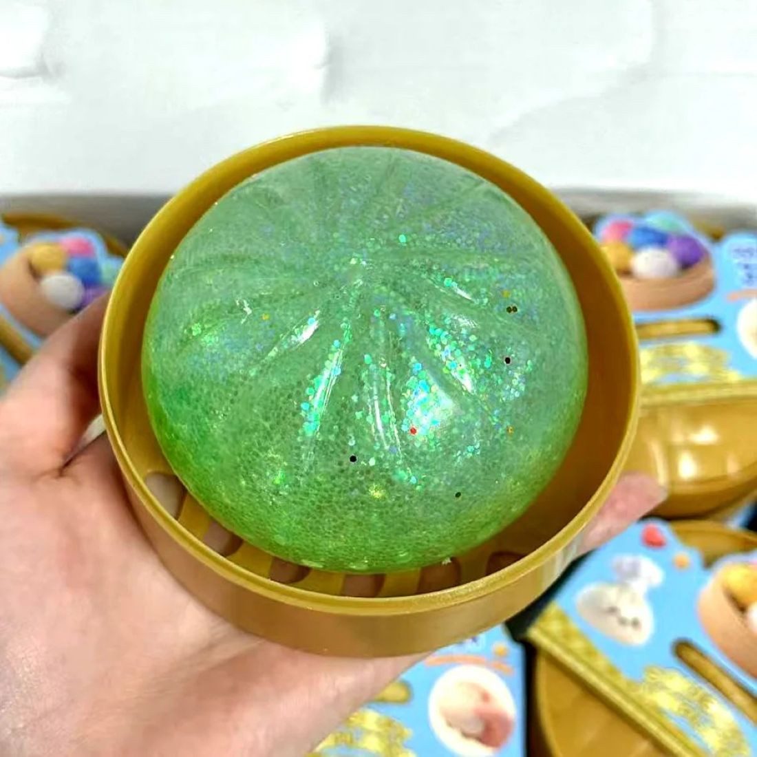 OLi Jumboball Realistisches Glitzer Knödel-Quetschspielzeug mit Bambus-Dampfgarer, Stressabbau-Spielzeug Dumpling-Squishy