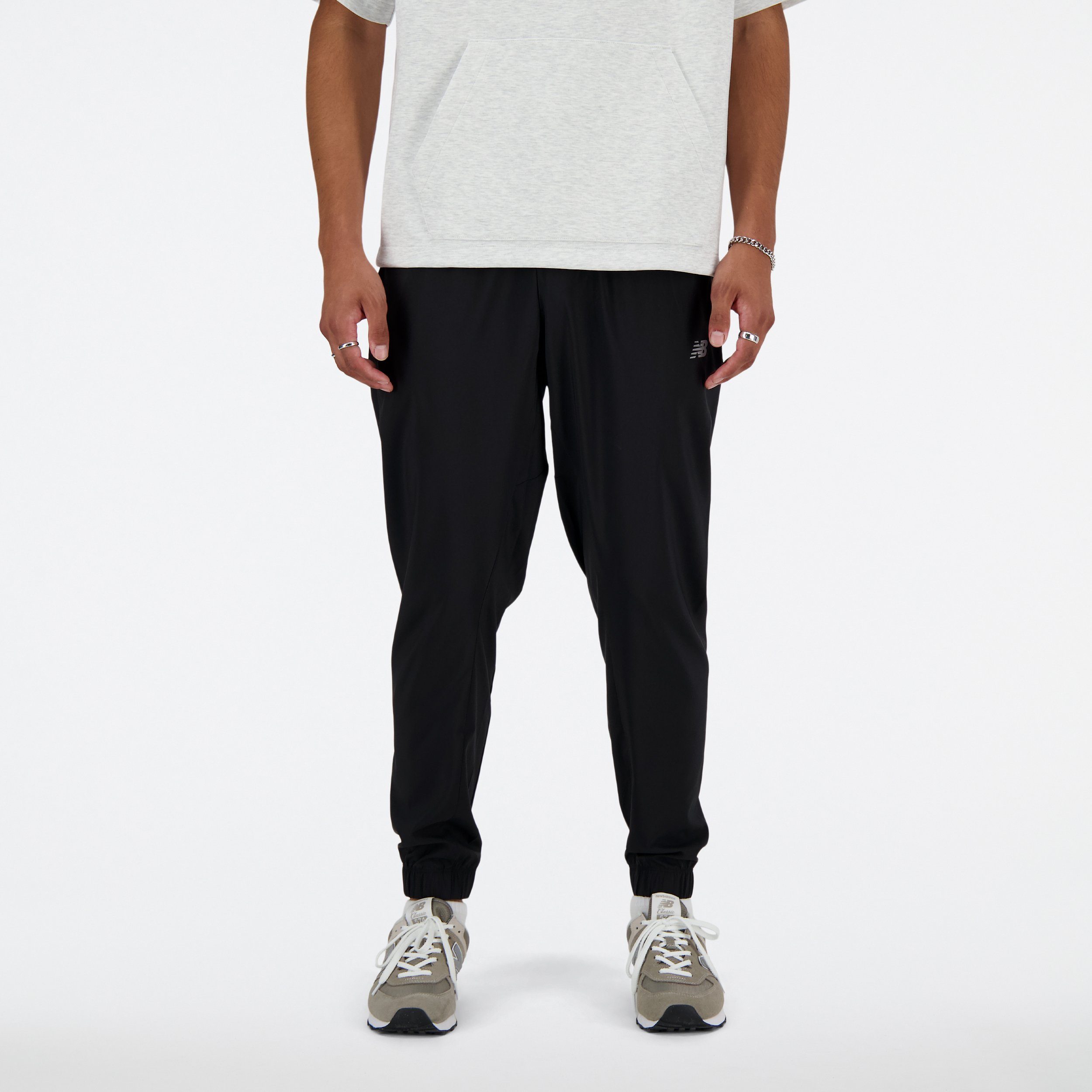 New Balance Trainingshose SPORT ESSENTIALS WOVEN JOGGER