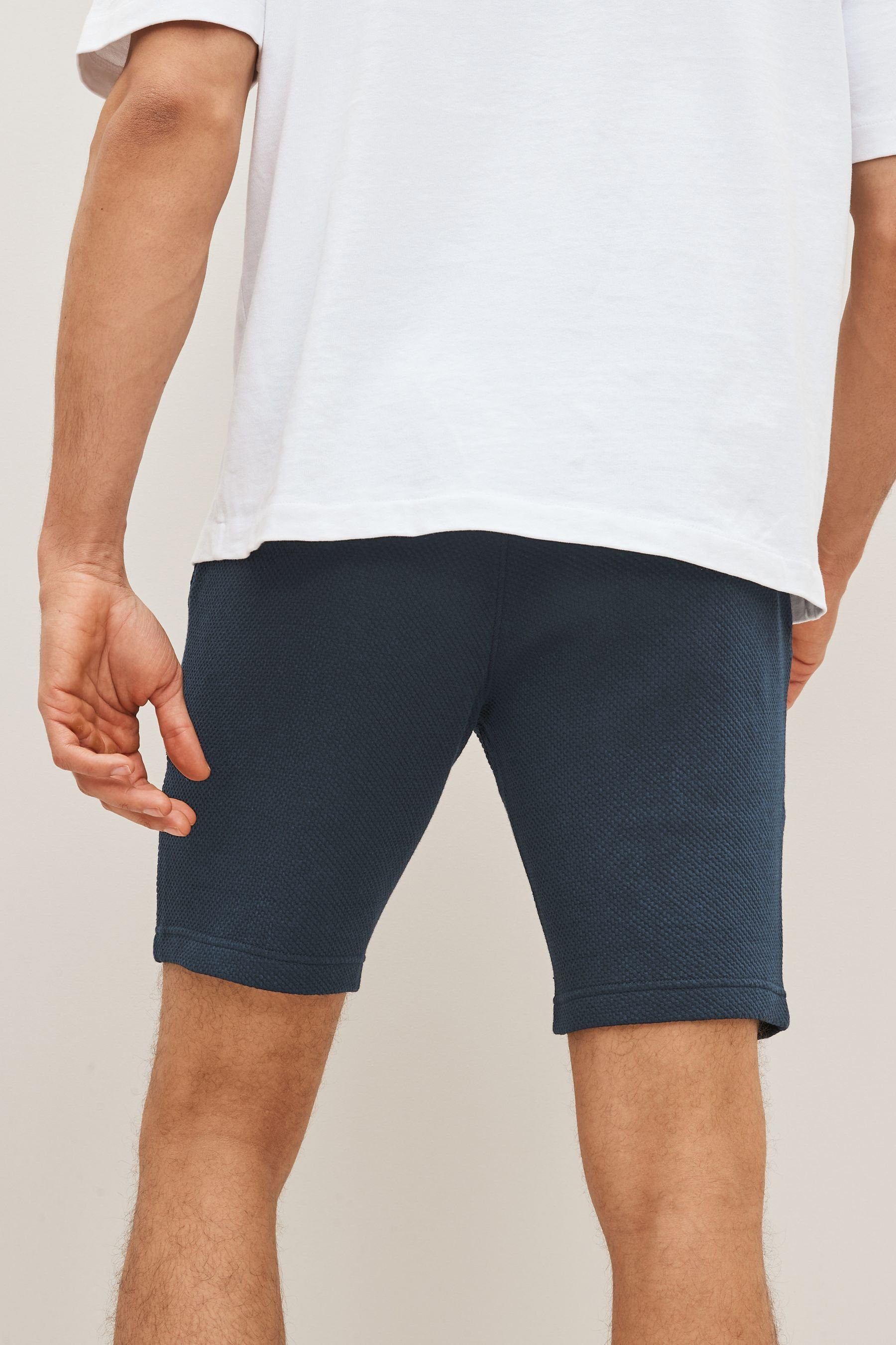 Next Sweatshorts Jersey-Shorts aus (1-tlg) Blue Material Navy strukturiertem