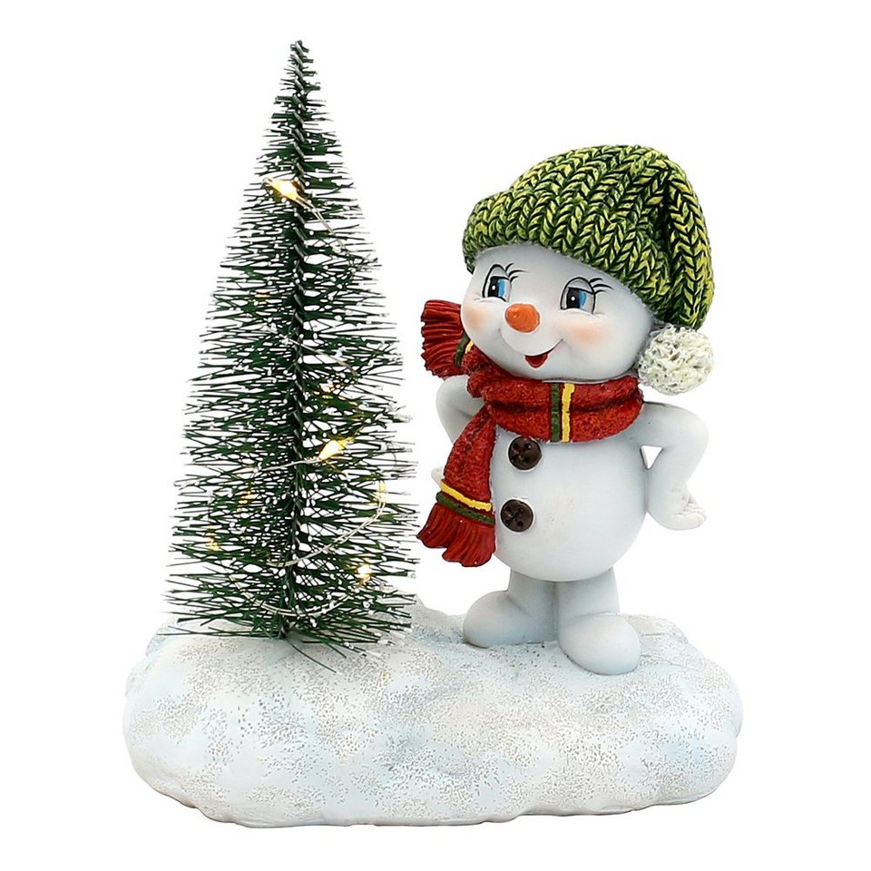 Dekohelden24 Dekofigur Schneekind - Schneemann mit Mütze und Schal in grün  und rot, mit beleuchteten LED Weihnachtsbaum, L/B/H 12 x 7,5 x 14