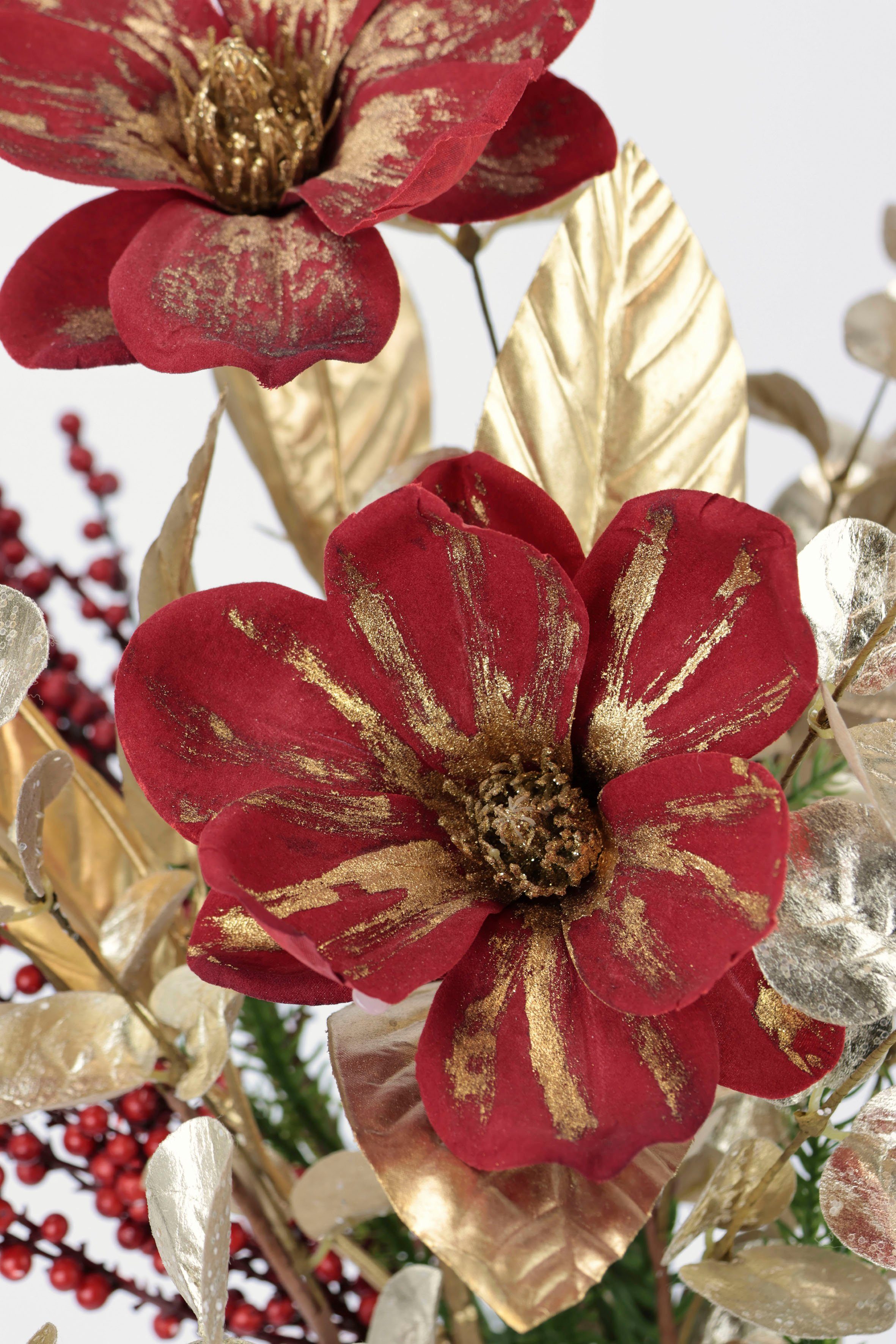 Winterliche Kunstpflanze Gesteck mit Magnolie in günstig online kaufen