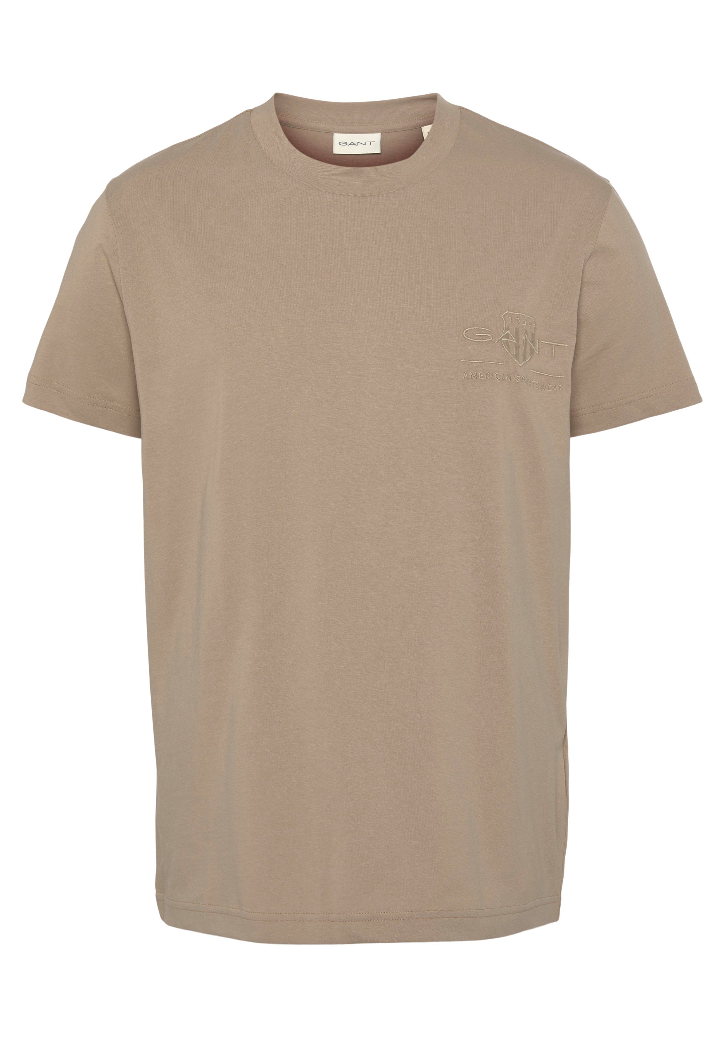 Gant T-Shirt REG MED concrete beige der TONAL Logostickerei SS auf mit Brust SHIELD TSHIRT