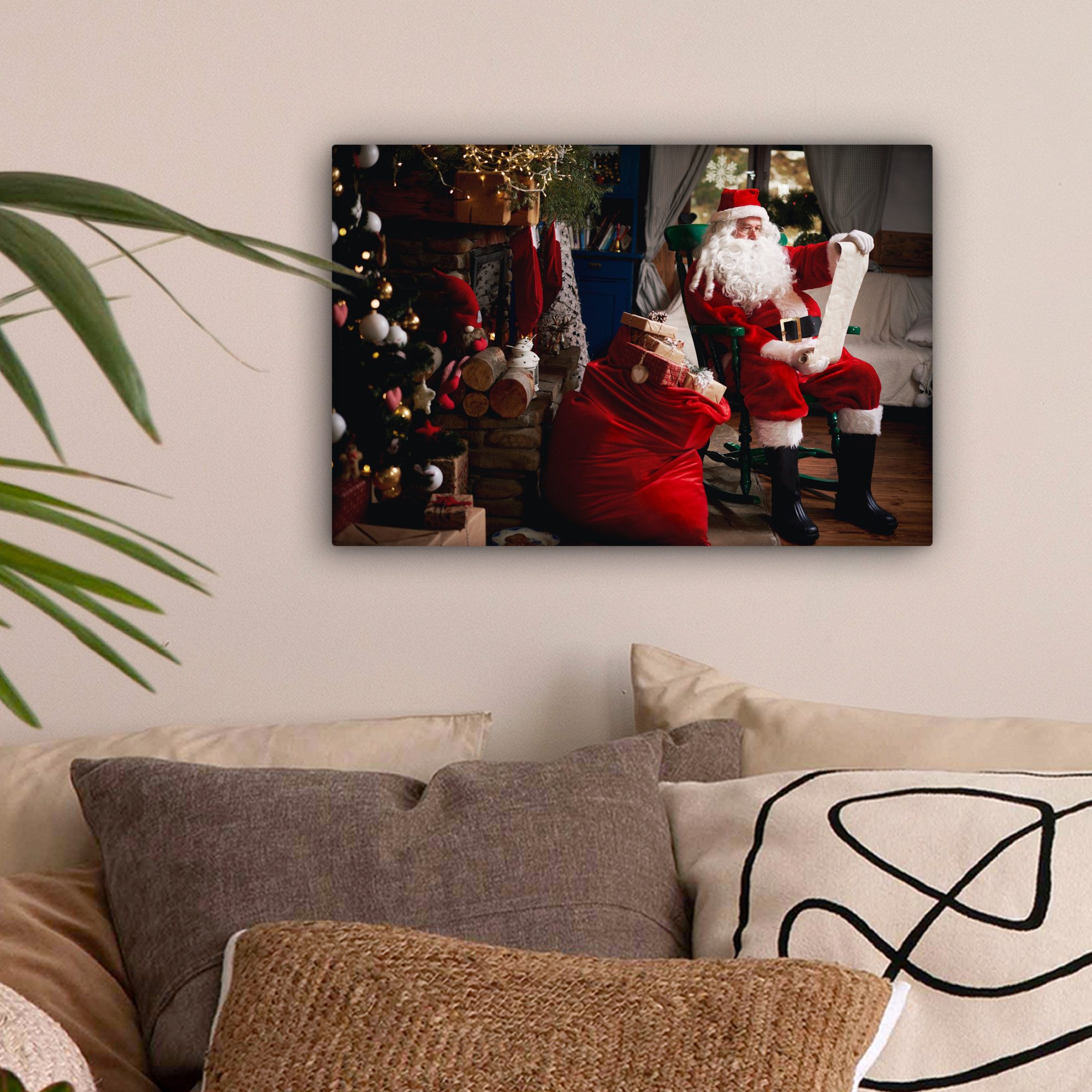 OneMillionCanvasses® Leinwandbild Der Weihnachtsmann sitzt auf einem Stuhl mit einem Sack voller Geschen, Fotodruck (1 St), Leinwand Bilder Klein, Wand Dekoration Aesthetic 30x20 cm