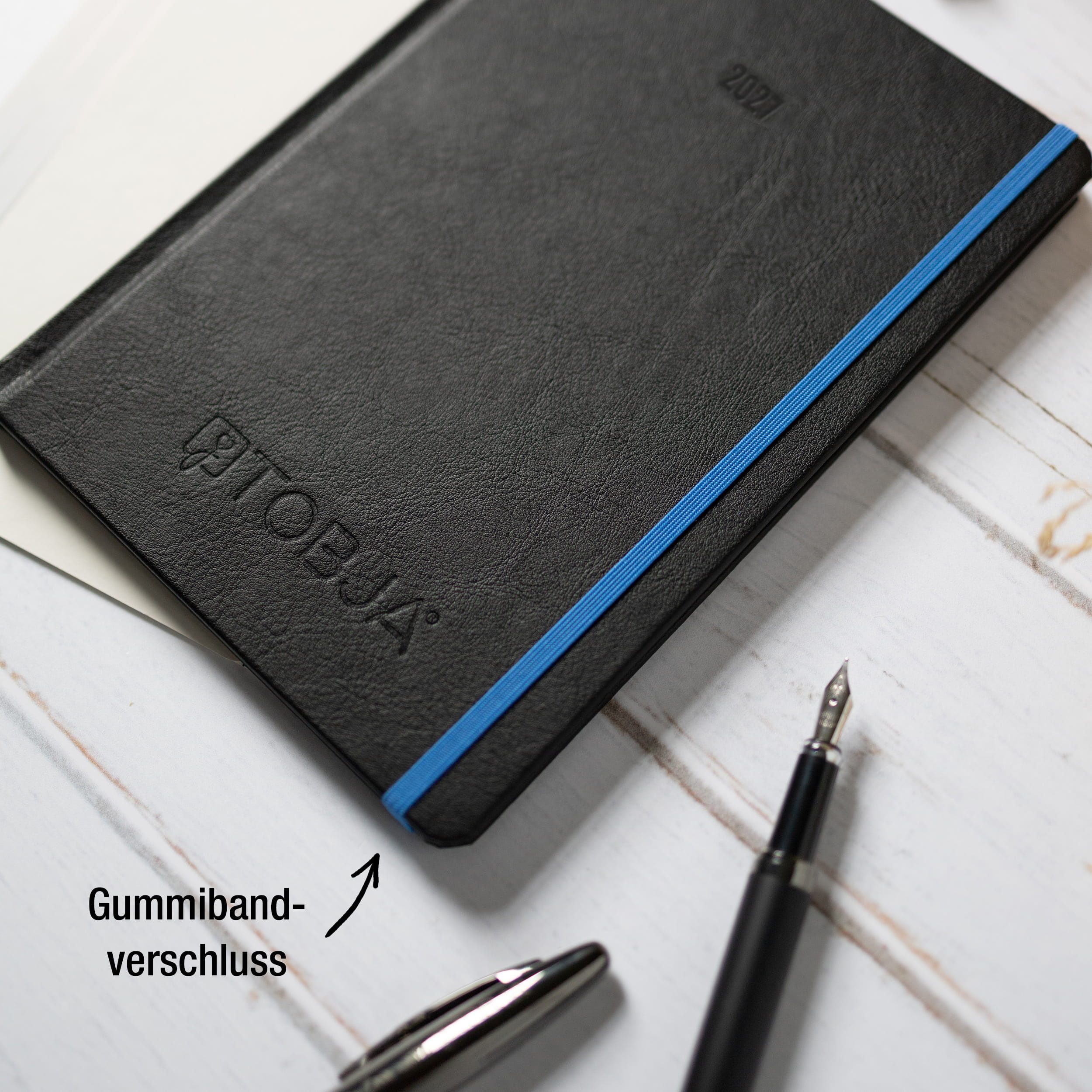 TOBJA Buchkalender Buchkalender 2027 A5 Nero Blau Hardcover Halbstunden 1 Woche 2 Seiten, Halbstunden-Taktung, FSC-Papier, Hardcover, Griffregister – Bild 4 von 5