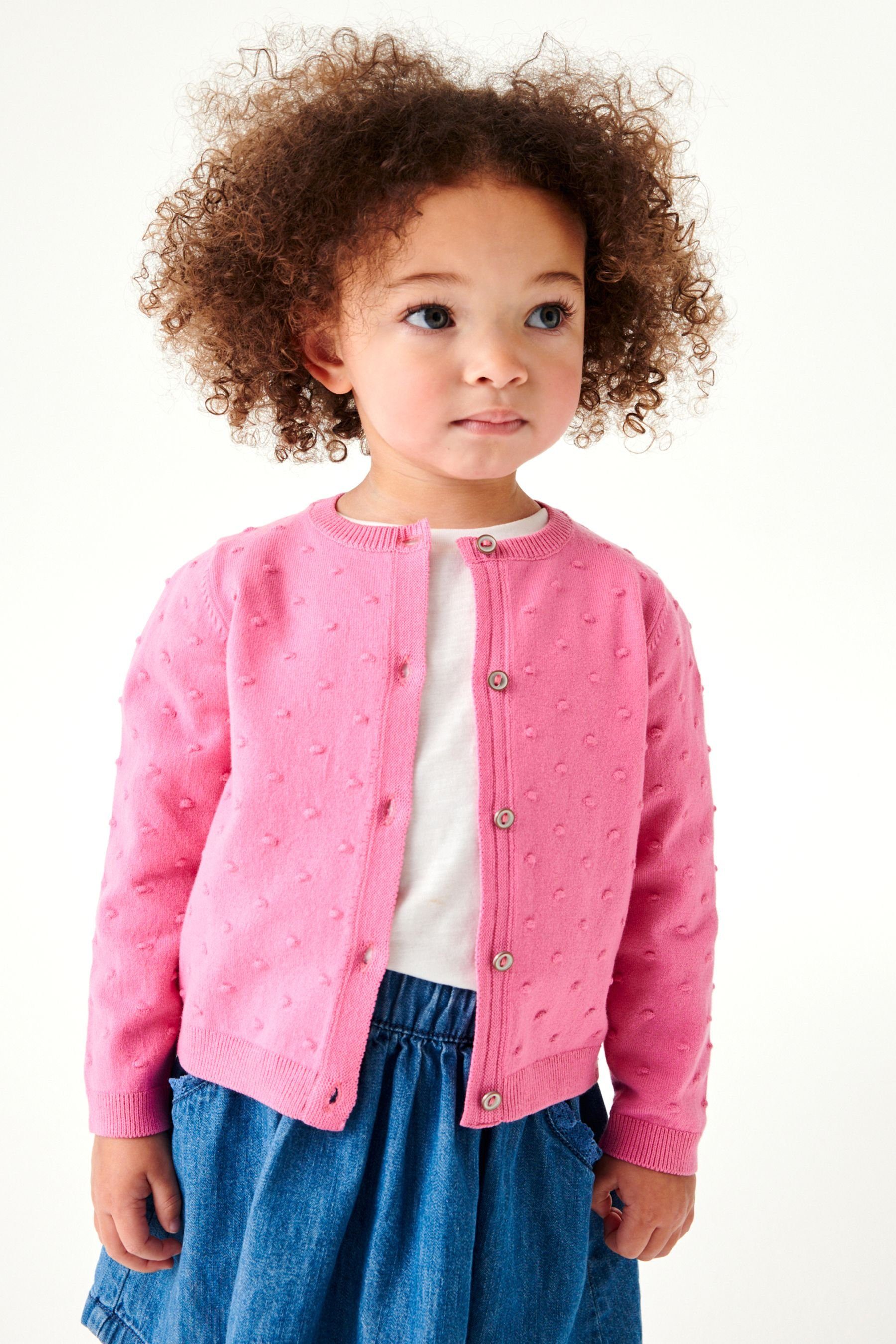 Pink Raspberry mit Strickjacke Strickjacke Next (1-tlg) Bommeln