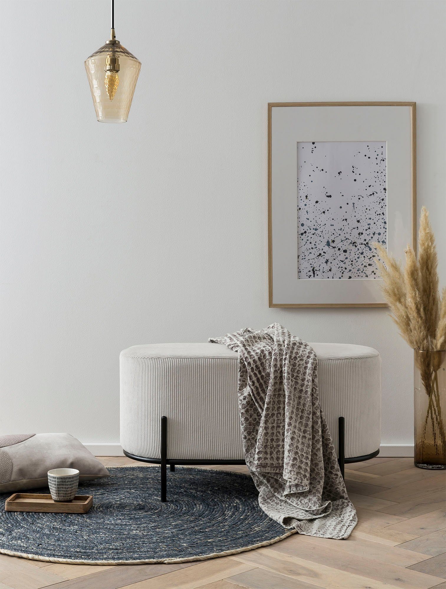 SalesFever Polsterhocker Komfortabler Polsterhocker, mit Design-Gestell aus schwarzem Metall