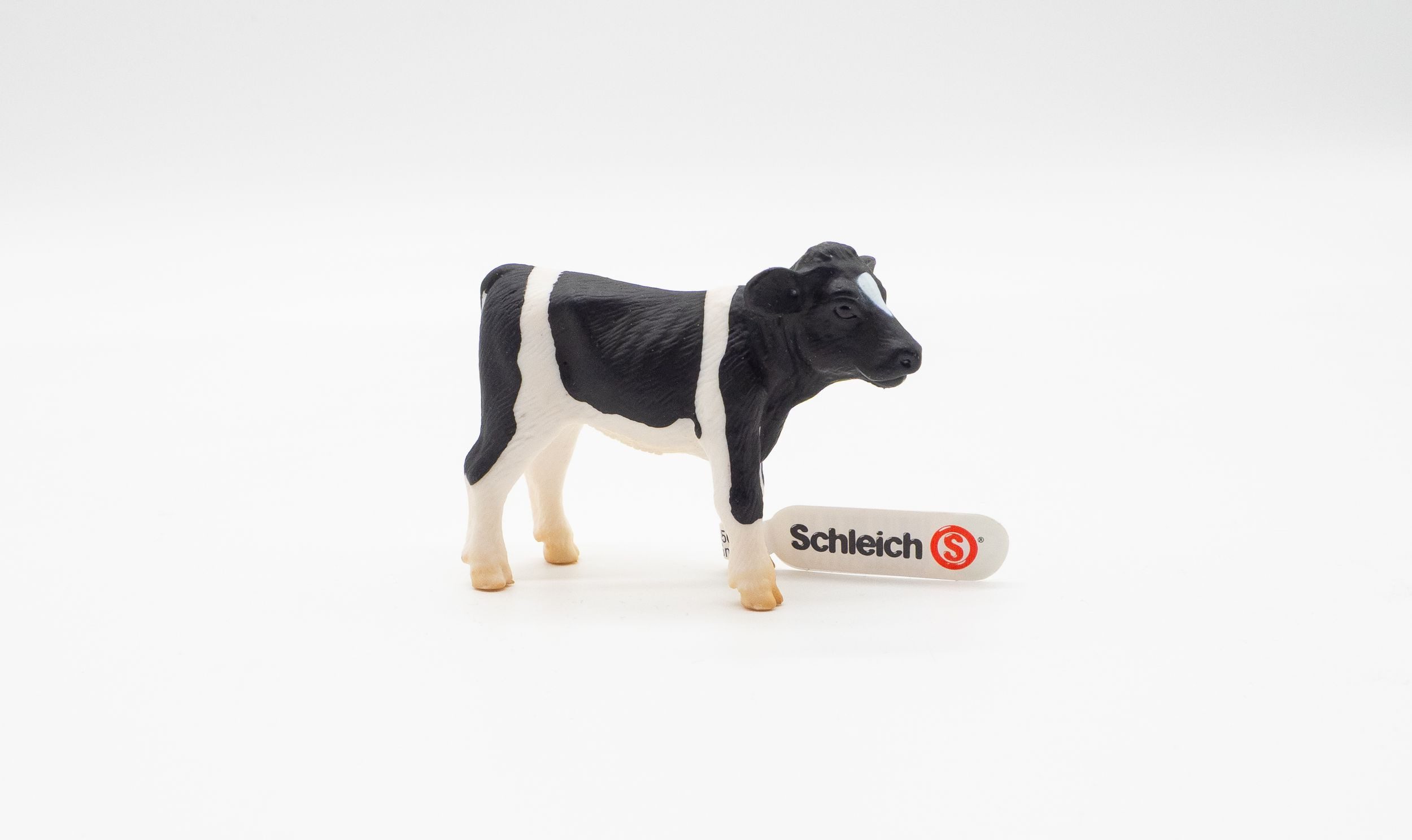 Schleich® Spielfigur Schleich 13139 Kalb schwarzbunt