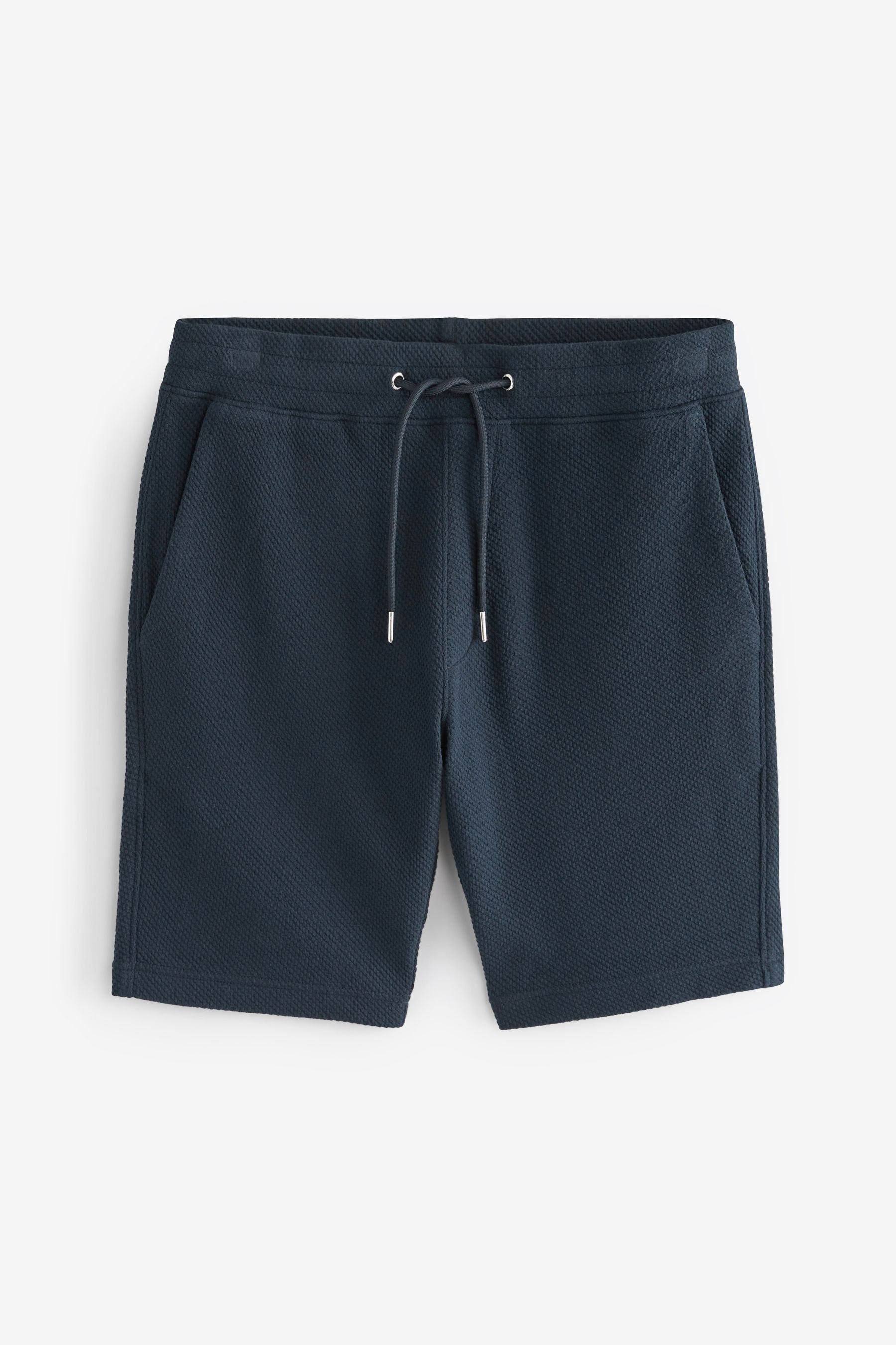 Next Sweatshorts Jersey-Shorts aus (1-tlg) Blue Material Navy strukturiertem