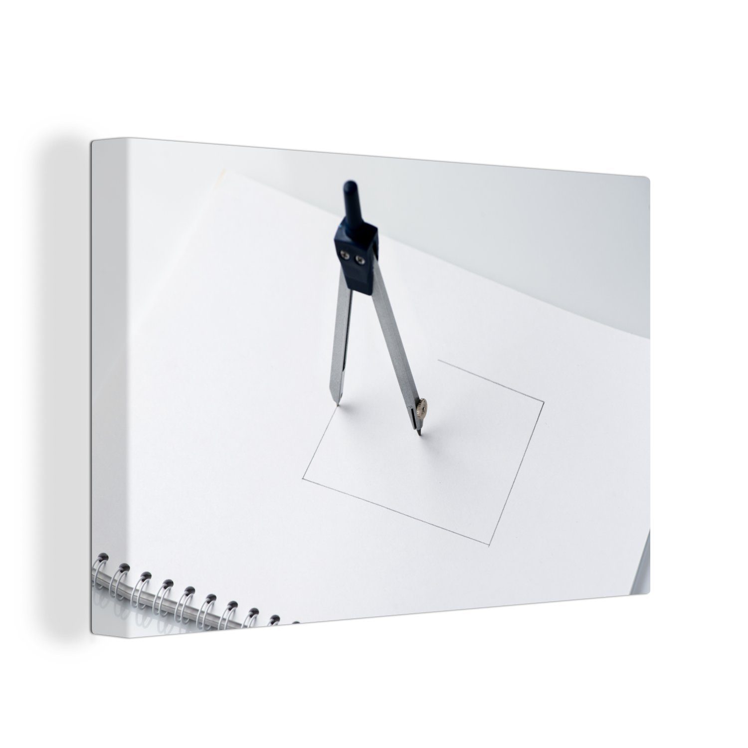 OneMillionCanvasses® Leinwandbild Ein Zirkel auf weißem Papier im Quadrat, (1 St), Wandbild Leinwandbilder, Aufhängefertig, Wanddeko, 30x20 cm