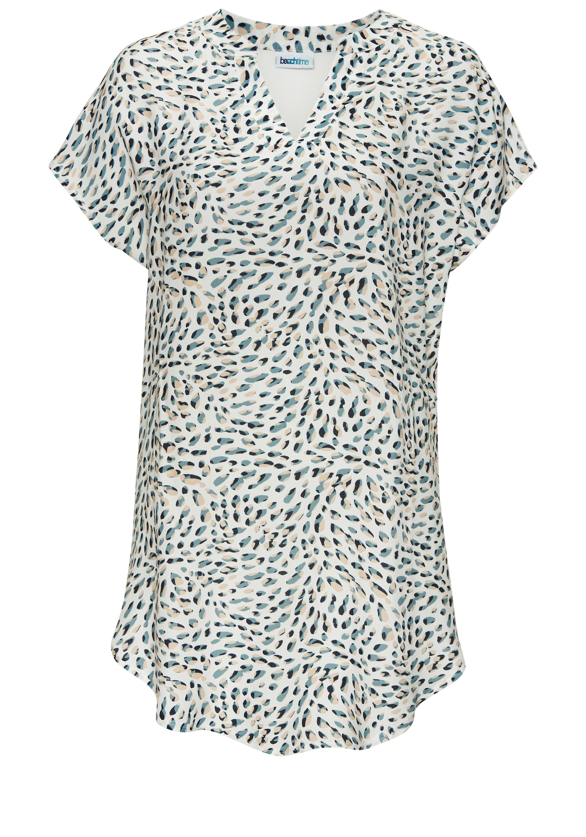 Beachtime Longshirt aus Materialmix. € 34,99