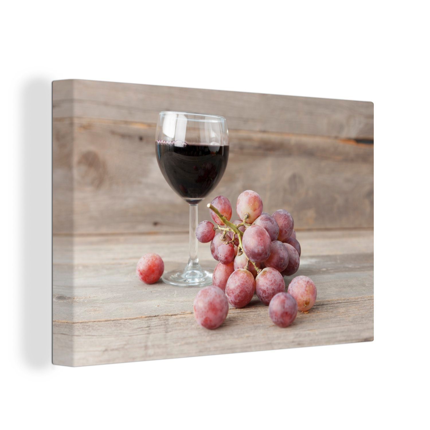 OneMillionCanvasses® Leinwandbild Frisch gepflückte rote Weintrauben und ein Glas Wein, (1 St), Wandbild Leinwandbilder, Aufhängefertig, Wanddeko, 30x20 cm