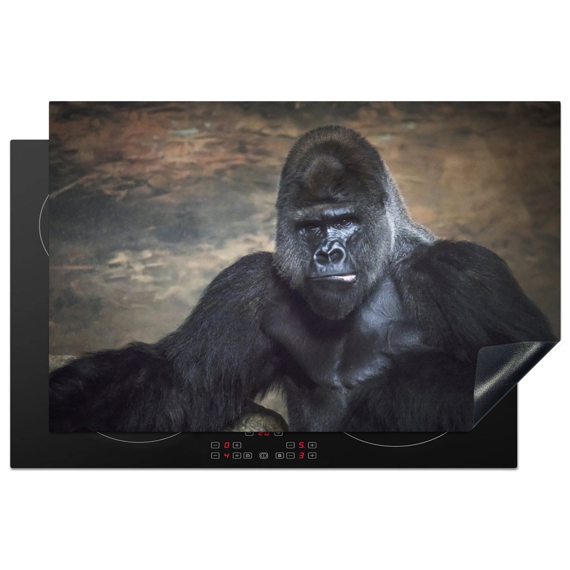 MuchoWow Herdblende-/Abdeckplatte Porträtbild eines schwarzen Gorillas, Vinyl, (1 tlg), 81x52 cm, Induktionskochfeld Schutz für die küche, Ceranfeldabdeckung