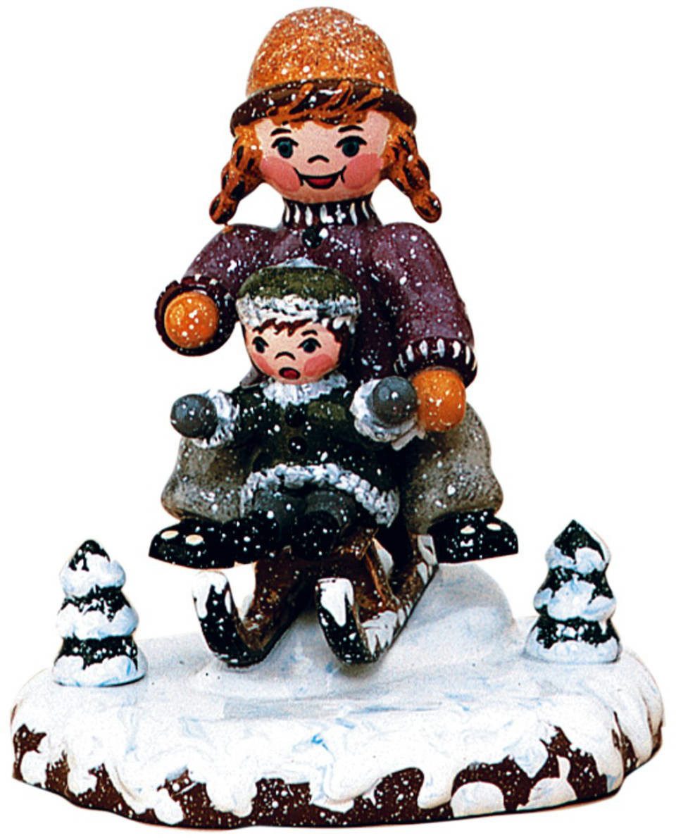 Hubrig Volkskunst Zschorlau Erzgebirge Sammelfigur Hubrig Winterkinder Schlittenfahrerin
