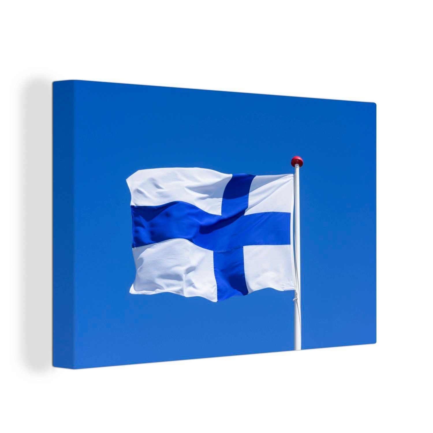 OneMillionCanvasses® Leinwandbild Finnische Flagge am blauen Himmel, (1 St), Wandbild Leinwandbilder, Aufhängefertig, Wanddeko, 30x20 cm