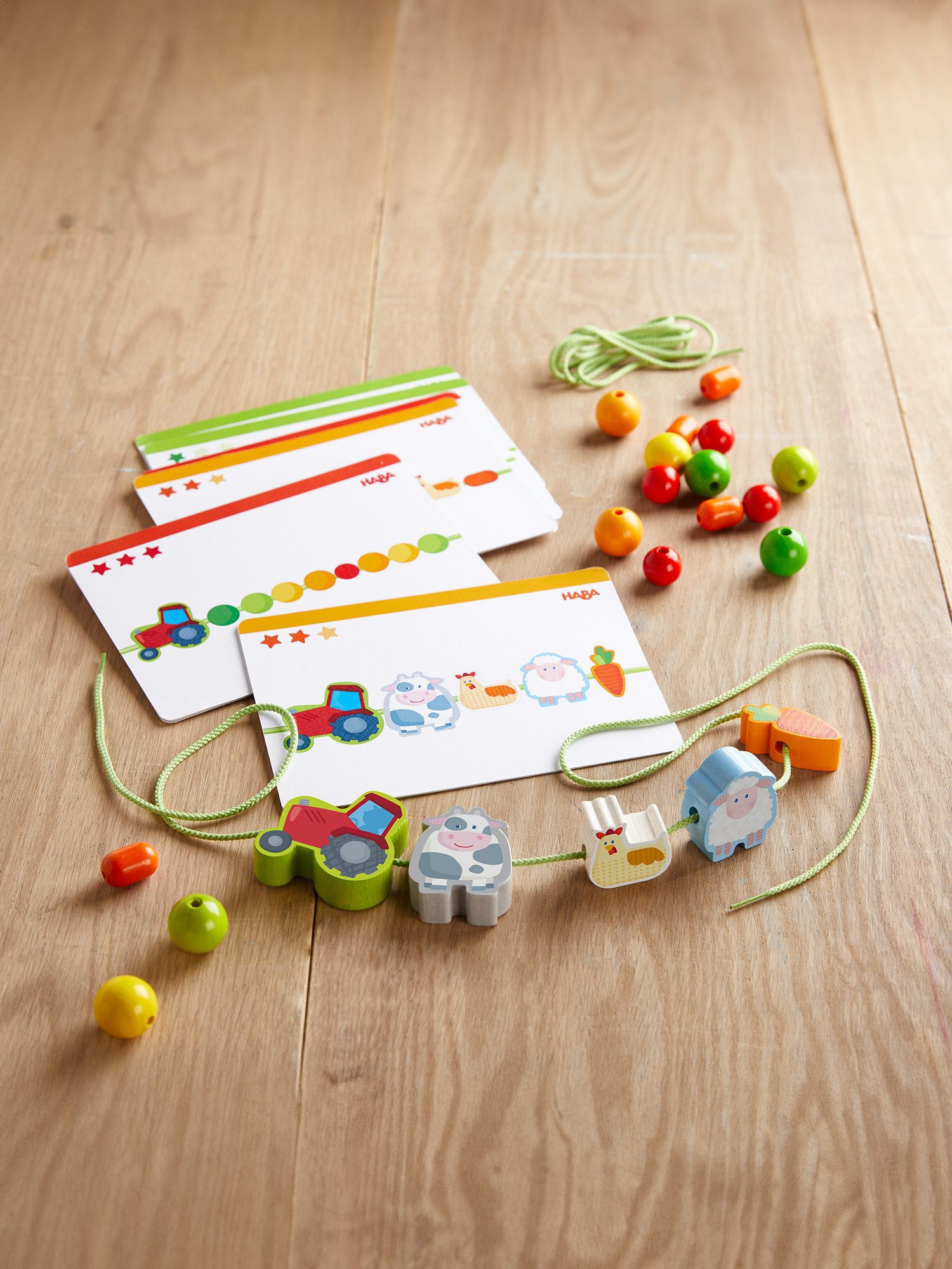 Haba Lernspielzeug Fädelspiele, spielend lernen und günstig online kaufen