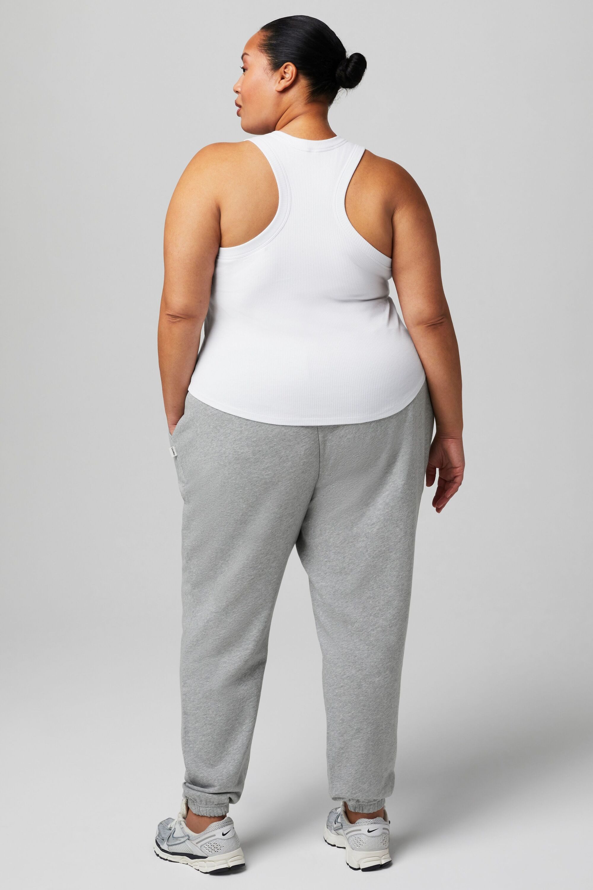 Fabletics Tanktop High Neck Rib mit integriertem BH gerippte Textur, geschwungene Träger