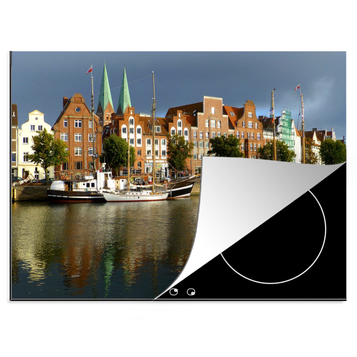 MuchoWow Herdblende-/Abdeckplatte Deutsche Architektur in Lübeck, Vinyl, (1 tlg), 70x52 cm, Mobile Arbeitsfläche nutzbar, Ceranfeldabdeckung | Herdabdeckplatten