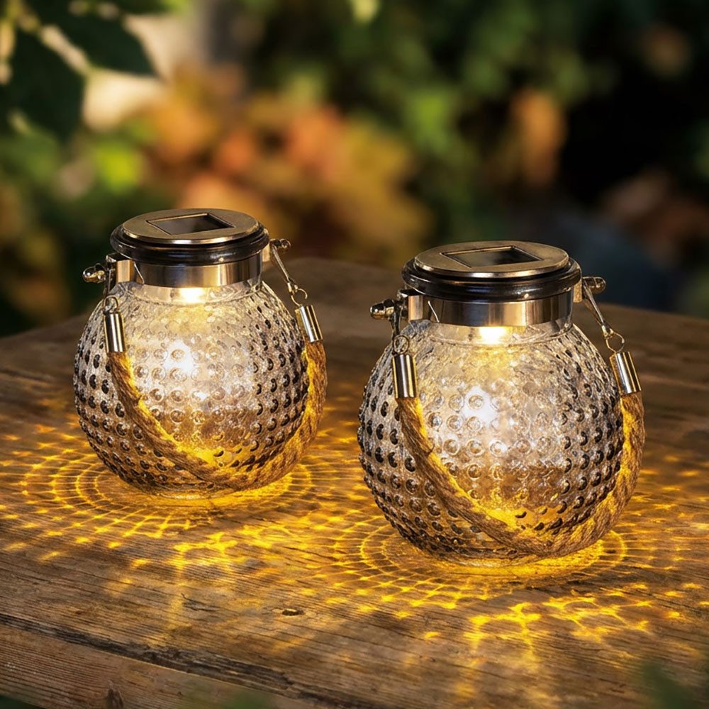 Haushalt International LED Solarleuchte, LED-Leuchtmittel fest verbaut, Warmweiß, LED Solarlampe Glas Außenlampe Gartendeko Laterne klar D 10,5cm 2x