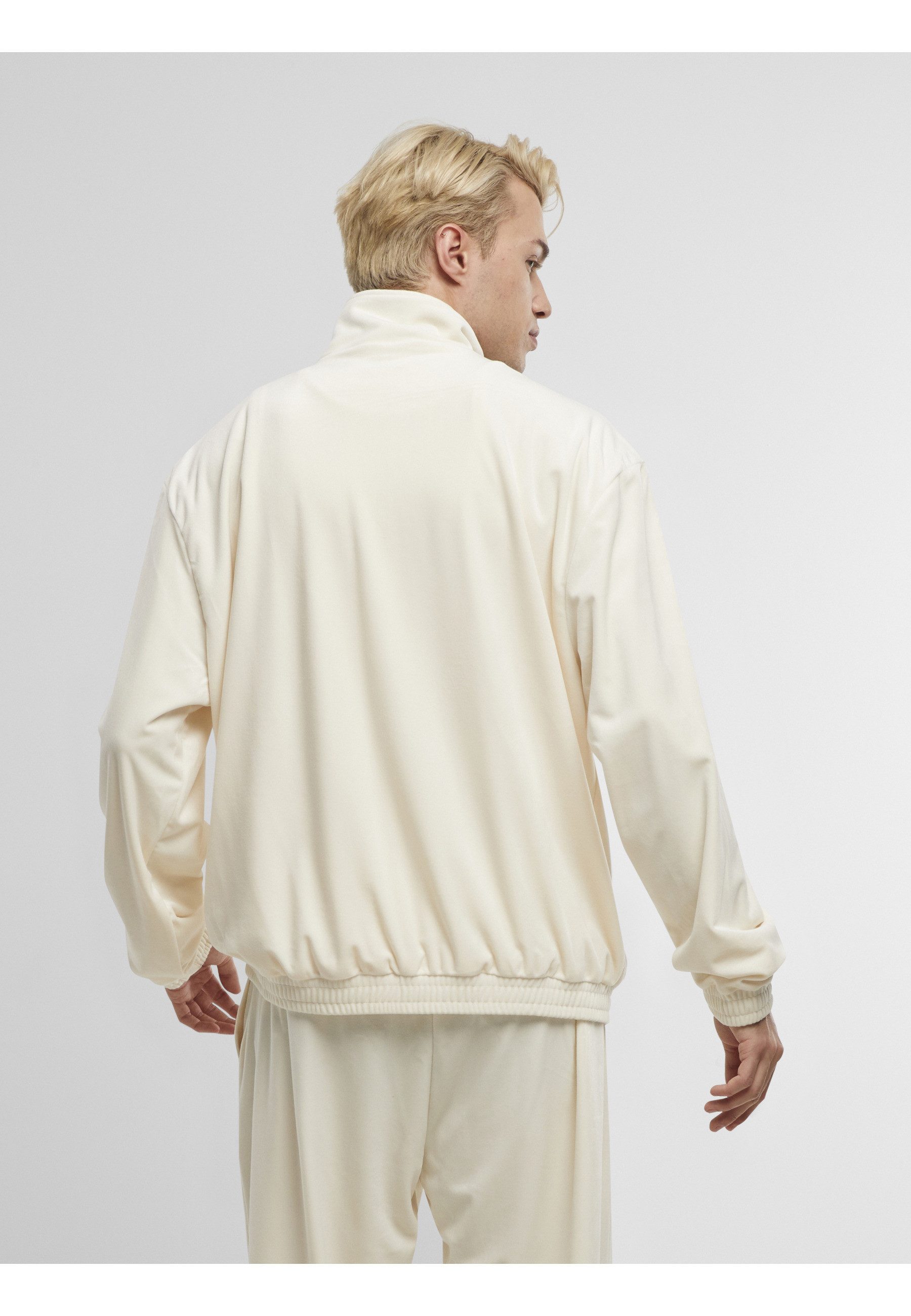 Karl Kani Trainingsjacke Karl Kani Kani Varsity Velours Trackjacket (1-St)