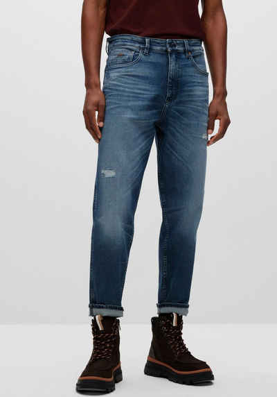 BOSS ORANGE Destroyed-Jeans mit Leder-Badge hinten am Saum