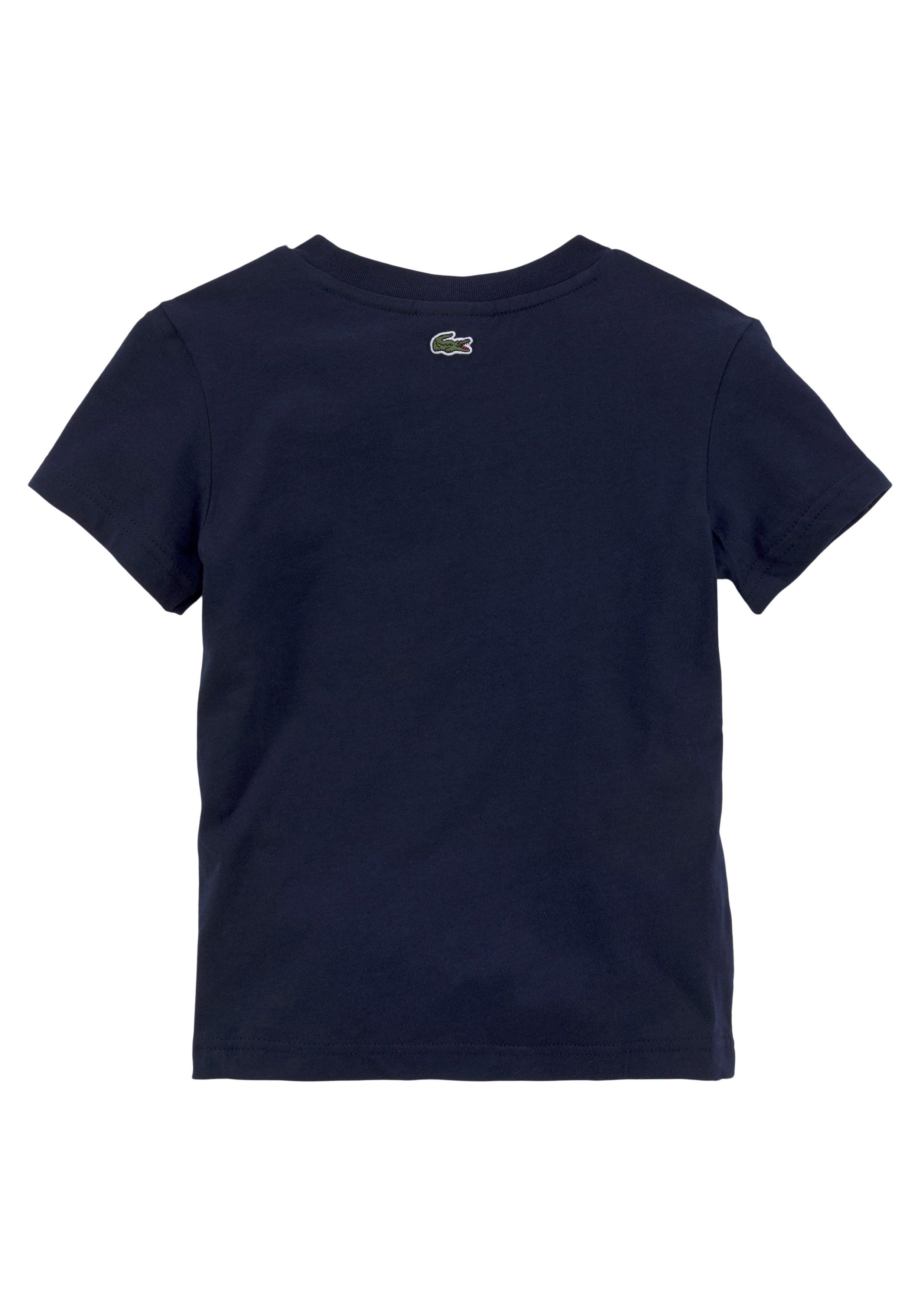 blue Lacoste mit navy T-Shirt großem Logodruck